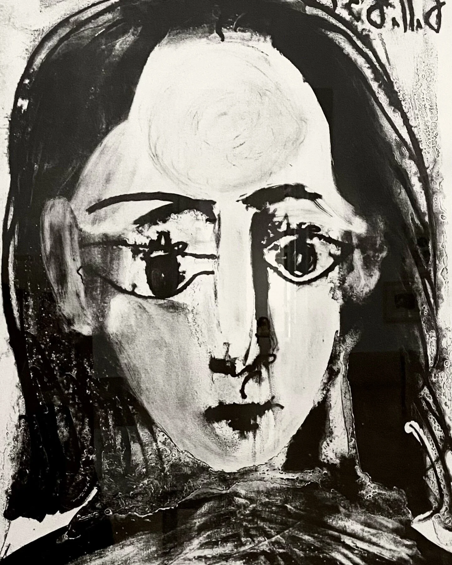 Picasso !!! 
y uno de sus garabatos de mujer