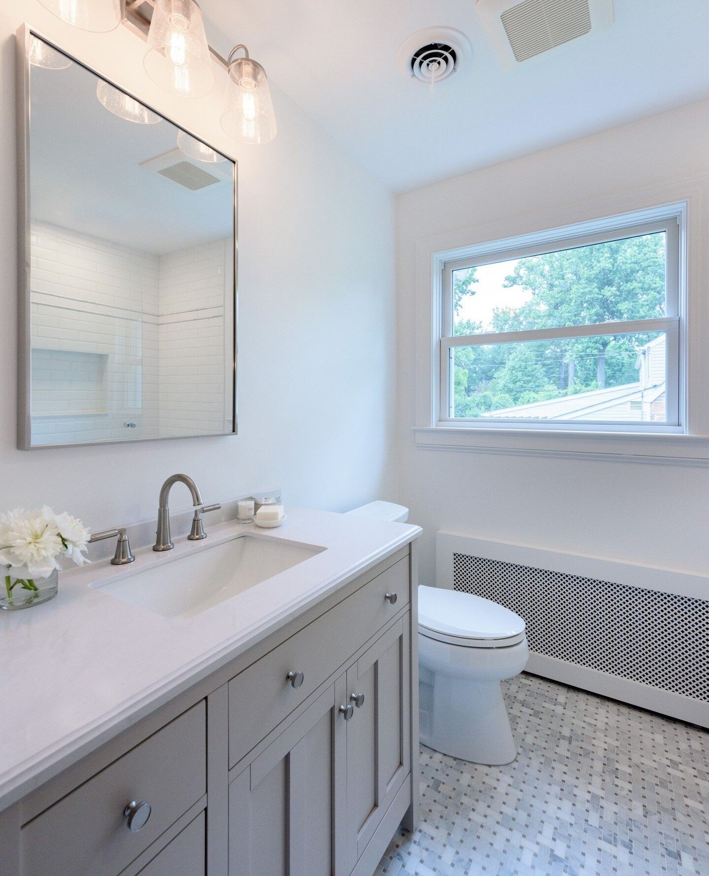 It's a bit of a before and after theme this week since today's post is highlighting another DRASTIC change!⁠
⁠
From blues and pinks and clean and white, this bathroom doesn't look anything like it did when we started. It's funny because often the wor