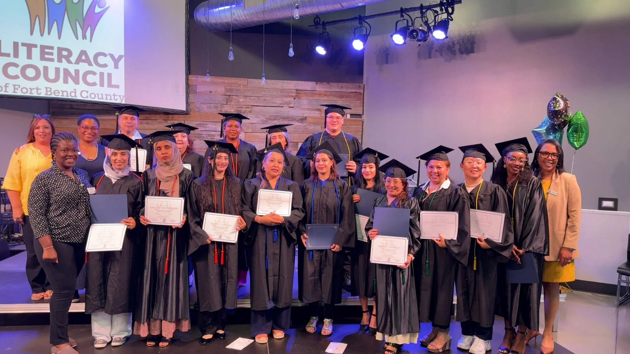 Grads and Staff_full view.JPG