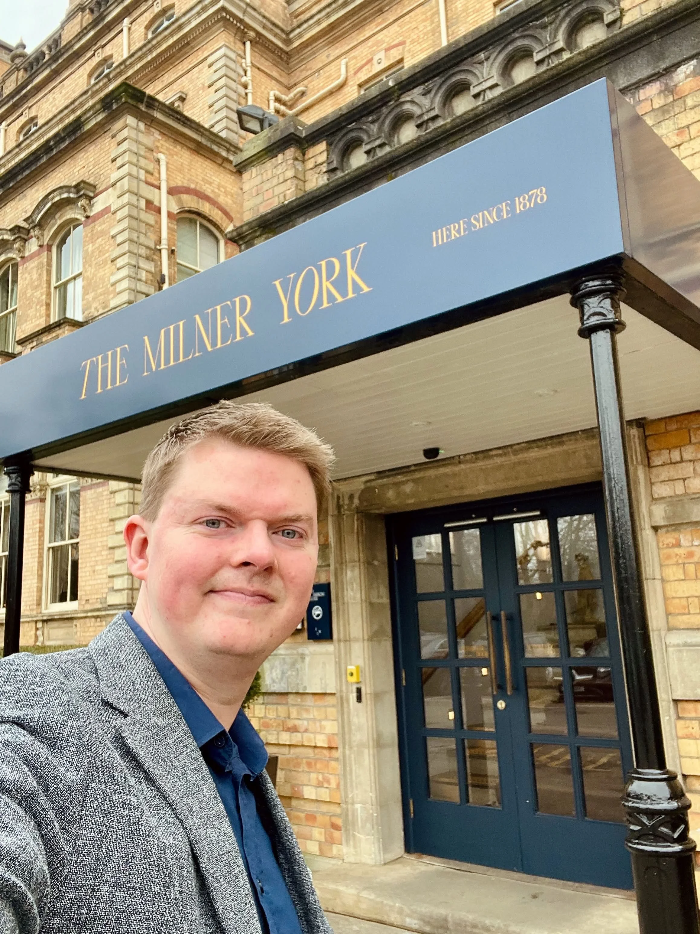 Martin Hamer at entrance of The Milner York.jpg