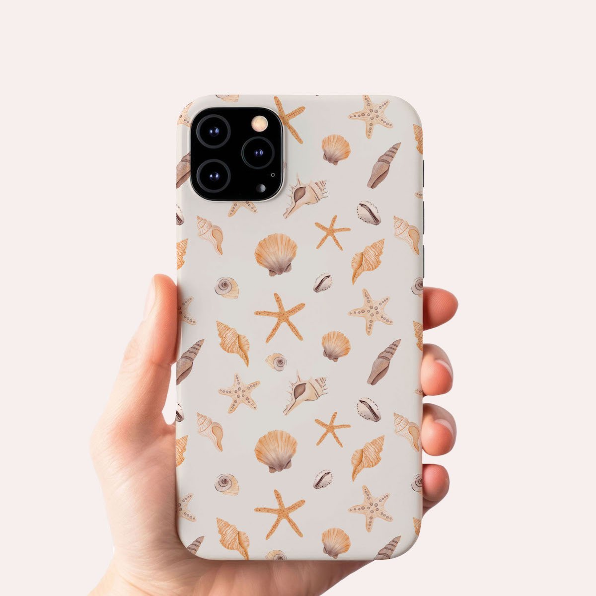 Trendy seashell pattern in warm mocha and orange hues, perfect for a stylish coastal-inspired phone case and tech accessories.