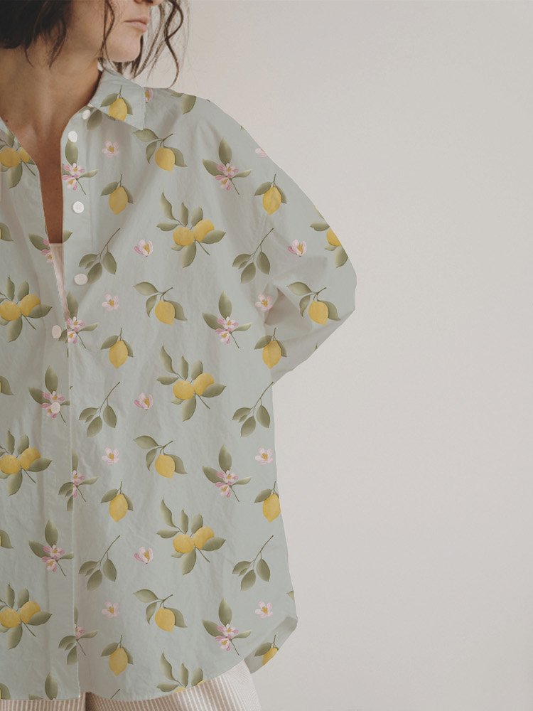 Trendy lemon pattern fabric with a citrus print, designed for stylish summer apparel, resort wear, and accessories.