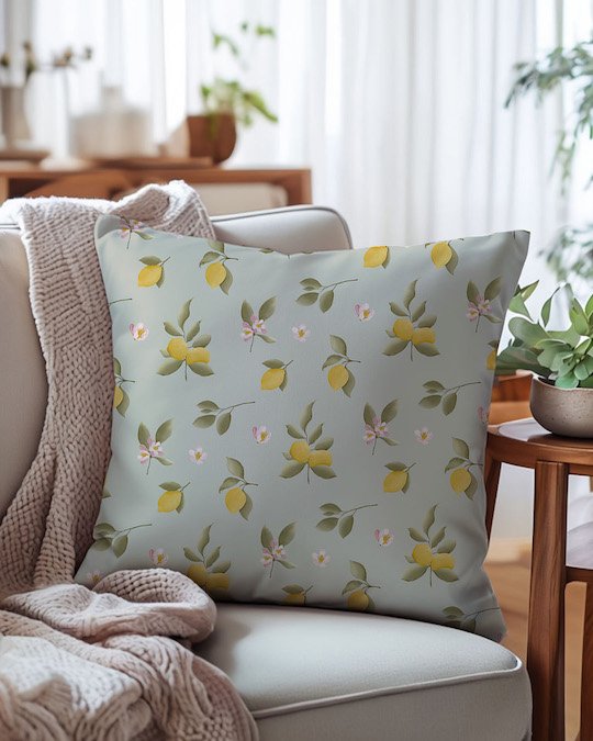 Lemon pattern cushion featuring a vibrant citrus print, perfect for summer-inspired home decor and interior design.