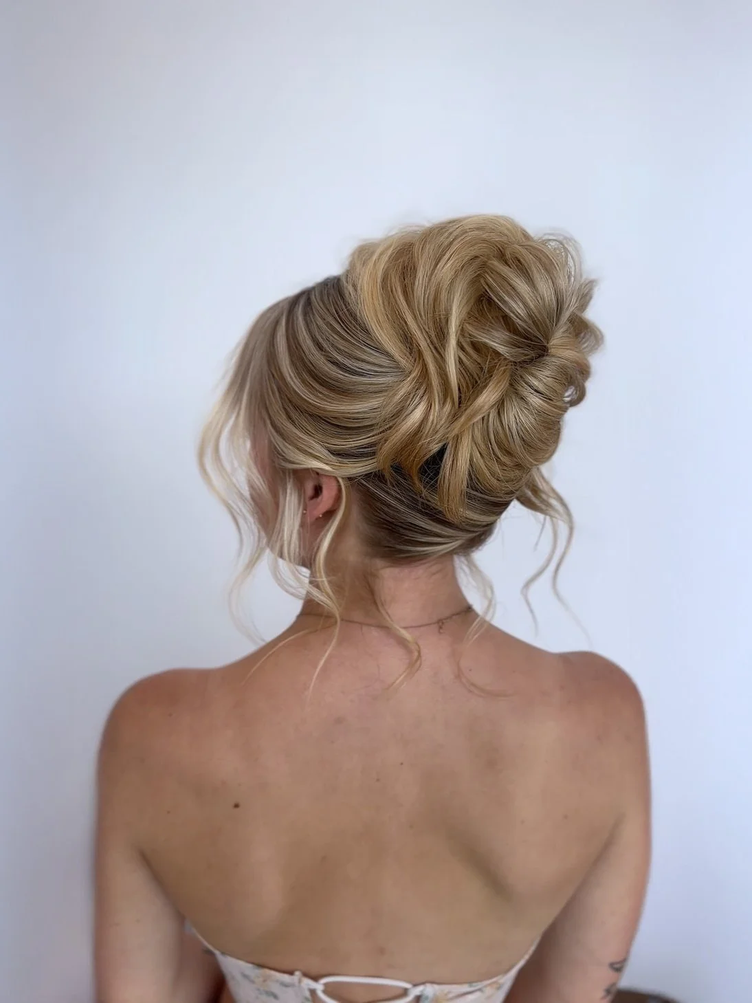 35 Soft Mid Height Updo.jpg