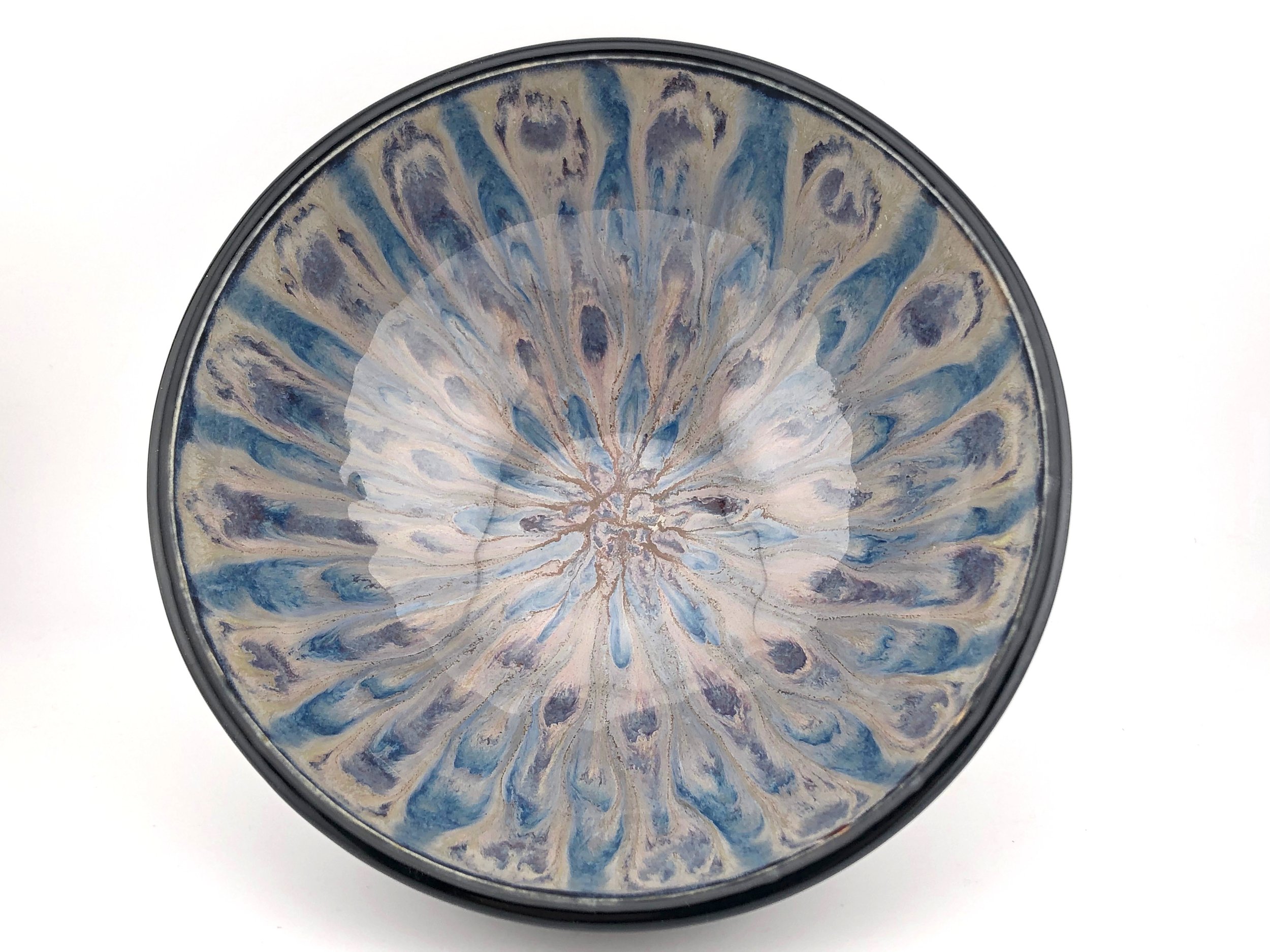 Ceramic bowl with blue and beige abstract design