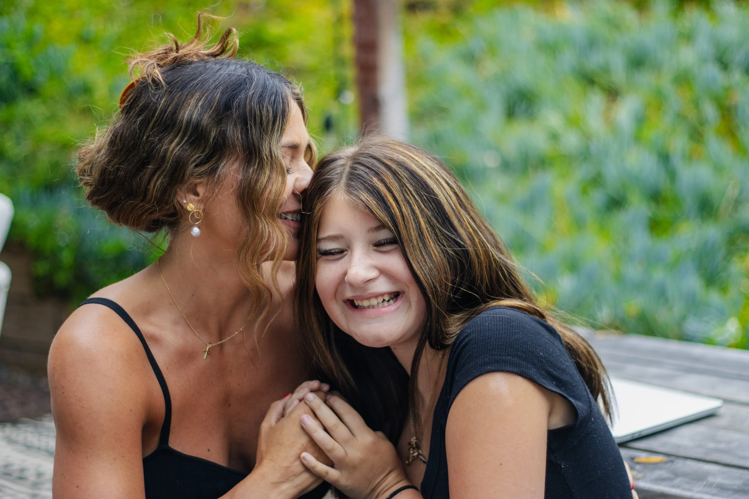 mother and teen daughter showing affection.jpg