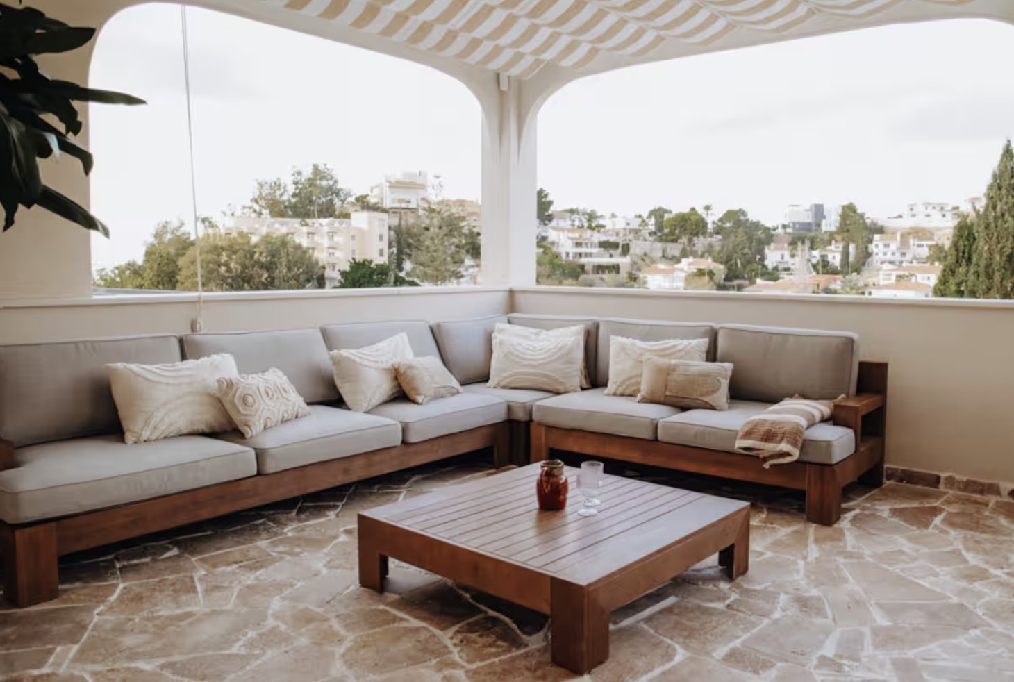 outdoor bohemian couch on the balcony in malaga spain.png