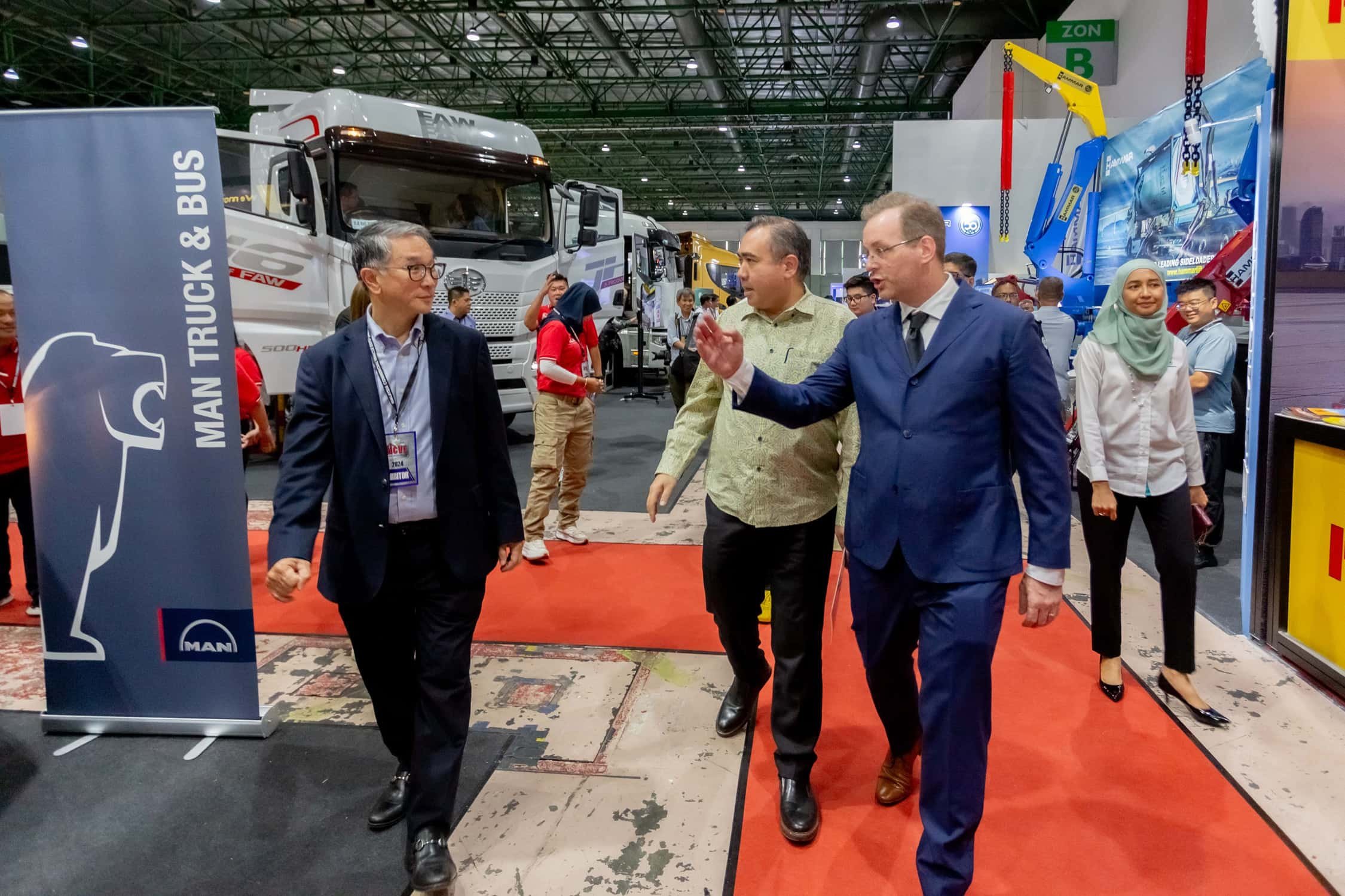 YB Anthony Loke Touring the Exhibition accompanied by Tan Keng Meng, CEO, Warisan TC Holdings Bhd, and Stefan Pertz (1).jpg