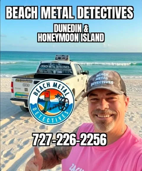A man at the beach is taking a selfie, smiling, wearing a camouflage cap with 'Beach Metal Detectives' on it. Behind him is a vehicle with a roof-mounted metal detector and a large overlay sign that says 'Beach Metal Detectives'. The background features ocean waves and a clear sky. The image includes text promoting 'Beach Metal Detectives' in Dunedin and Honeymoon Island, with a logo of a lighthouse and a palm tree, and a phone number 727-226-2256.