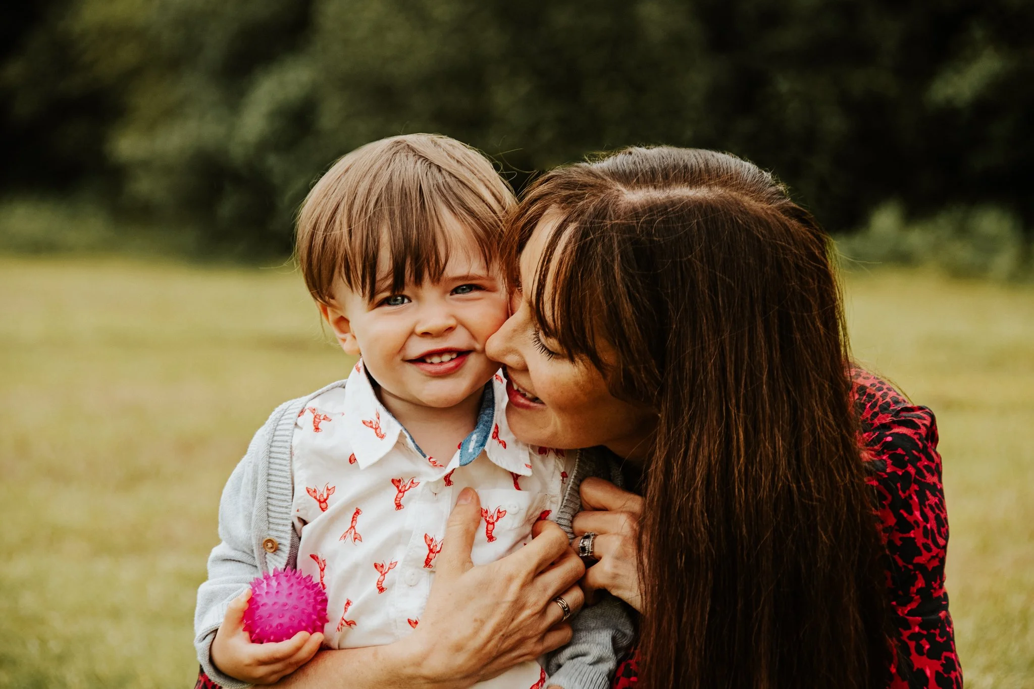 Relaxed family portrait photography captured outdoors. I am a wedding photographer based in Peterborough, Cambridgeshire, also offering natural family photography focused on connection.