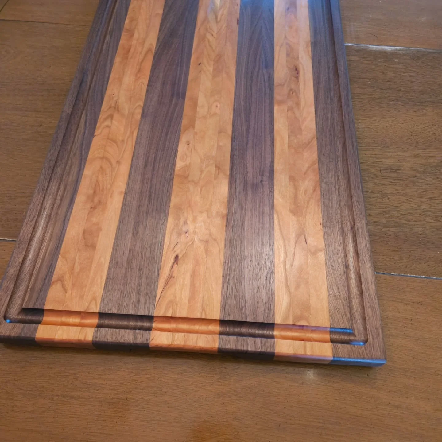 A local culinary artist commissioned what he referred to as a display board. A 30x18 pallet to show off and serve his delicacies from. 

Locally grown and harvested Indiana walnut and cherry to fill the need. I think this should do.

I hope his table