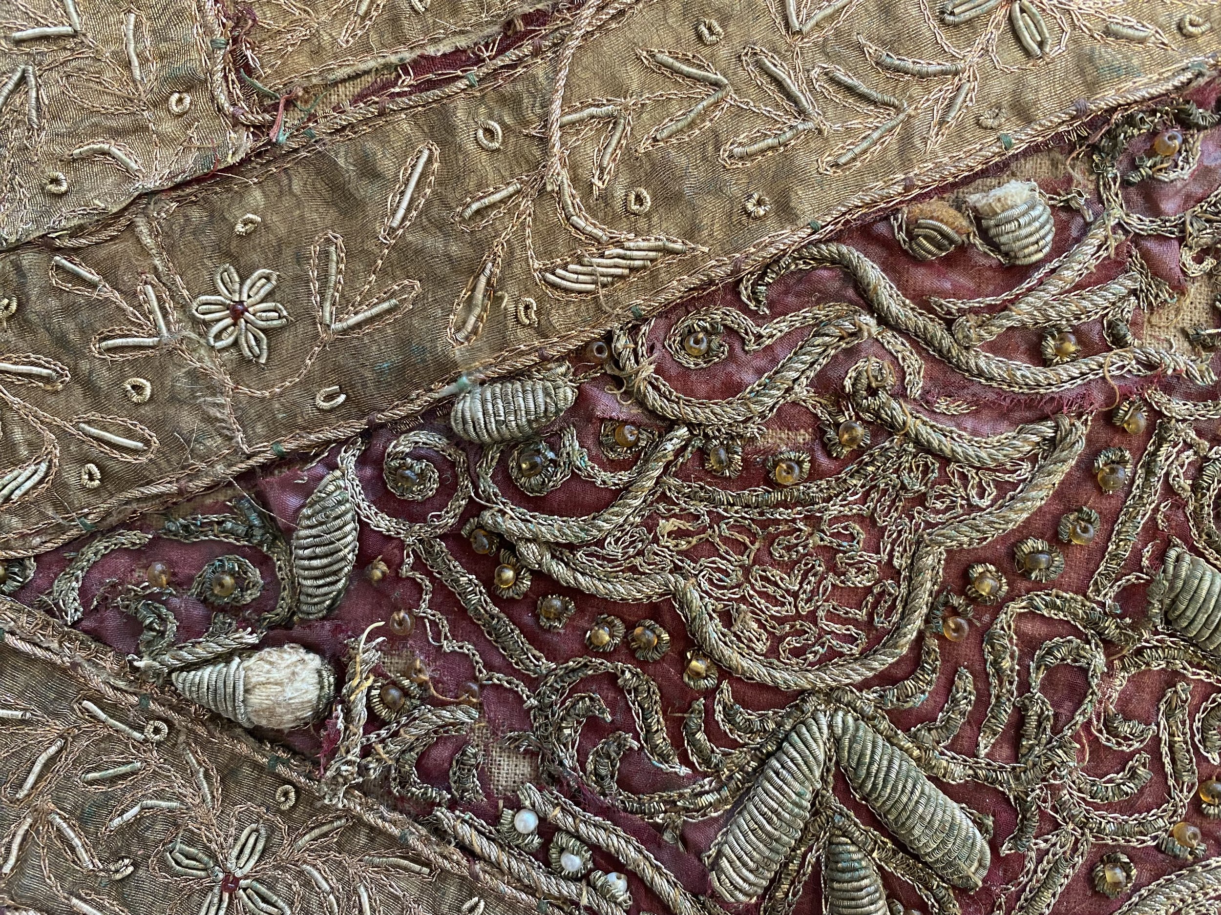 Area with missing goldwork before restoration