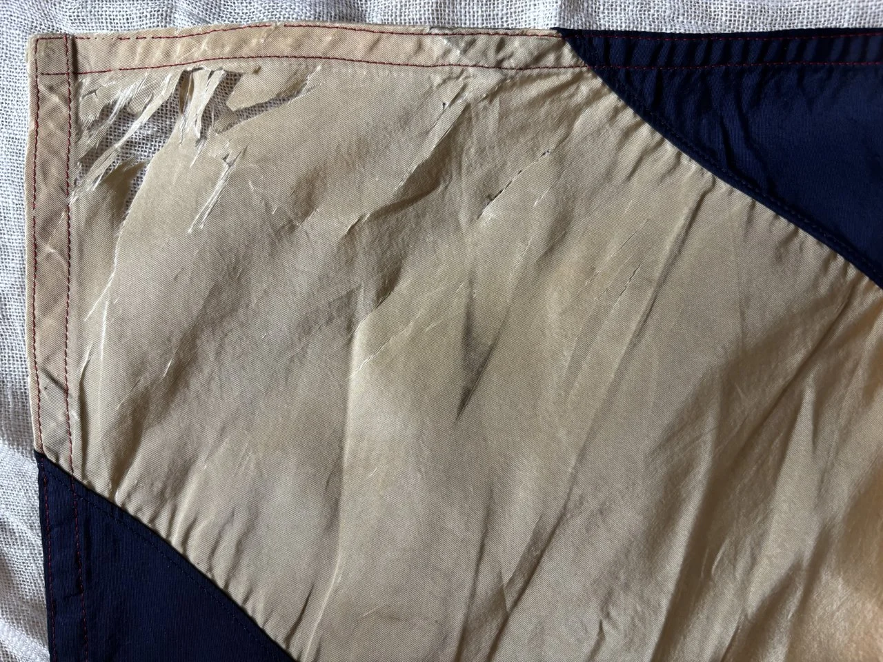 Torn corner before conservation