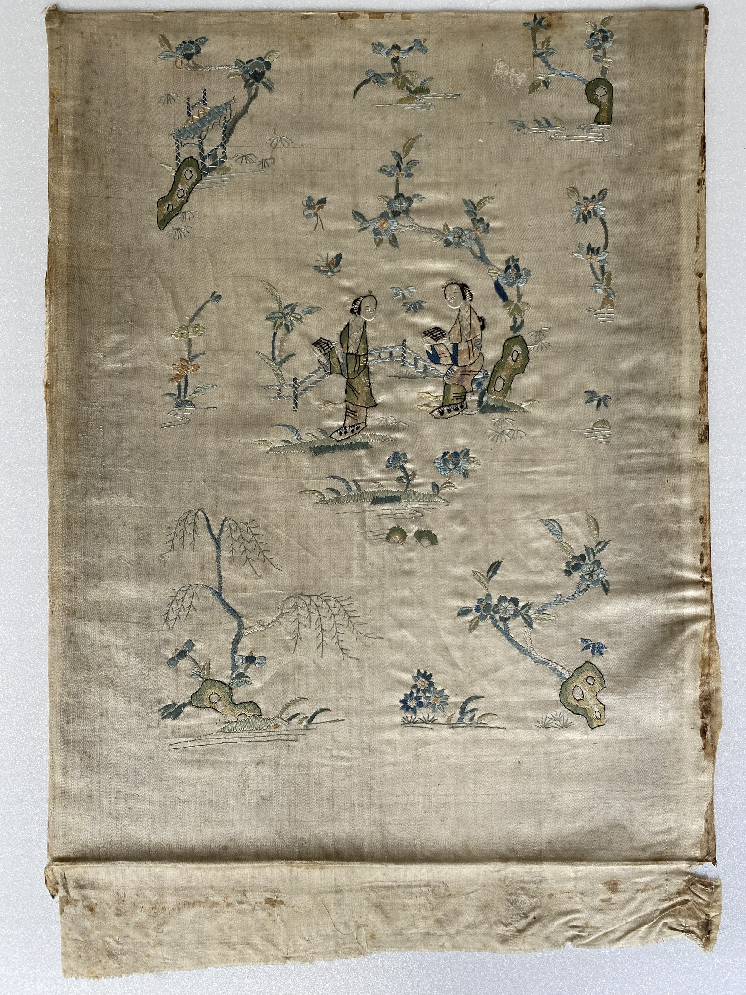 Textile after being removed from the frame