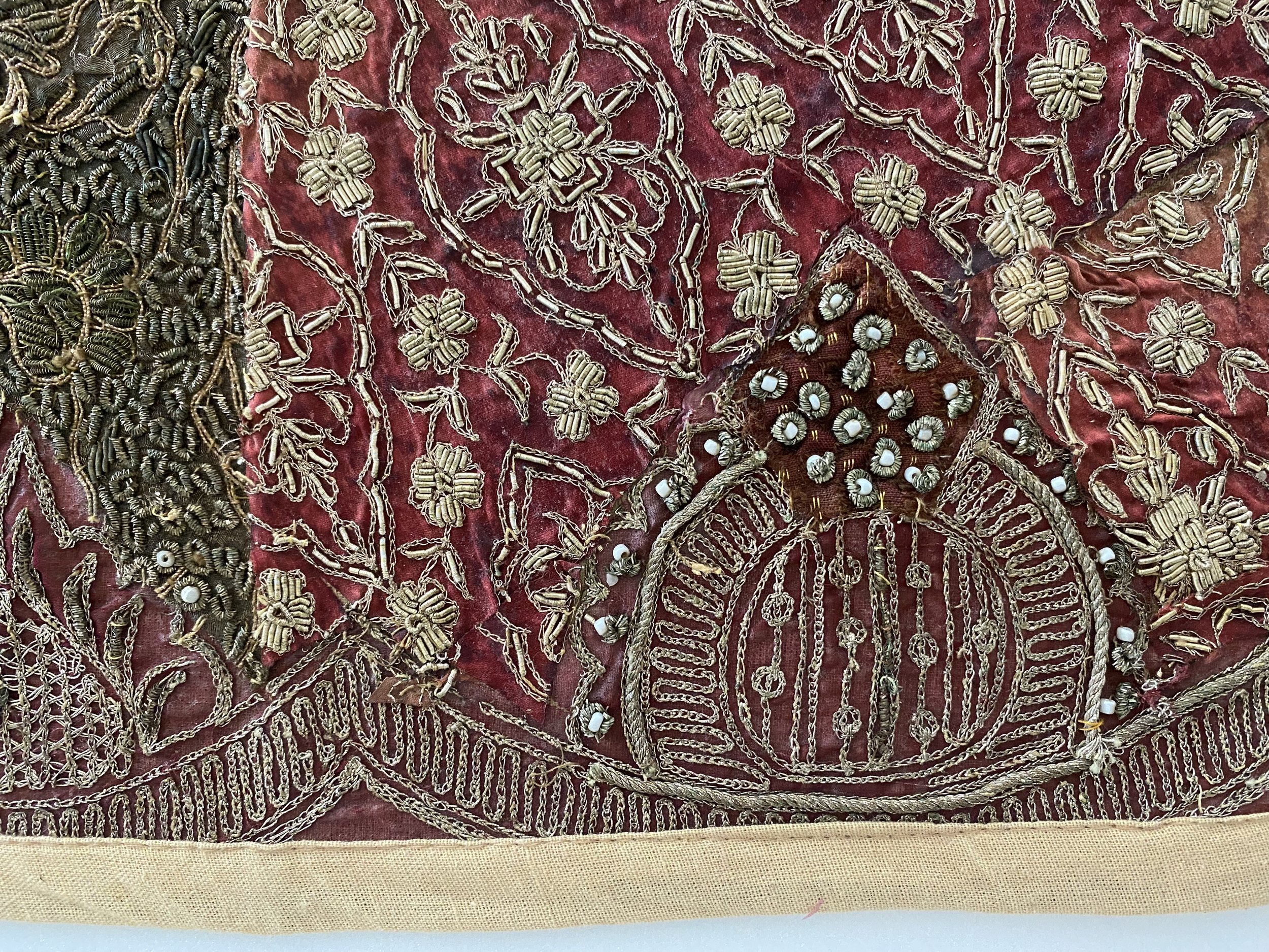 After securing of loose threads and embroidery