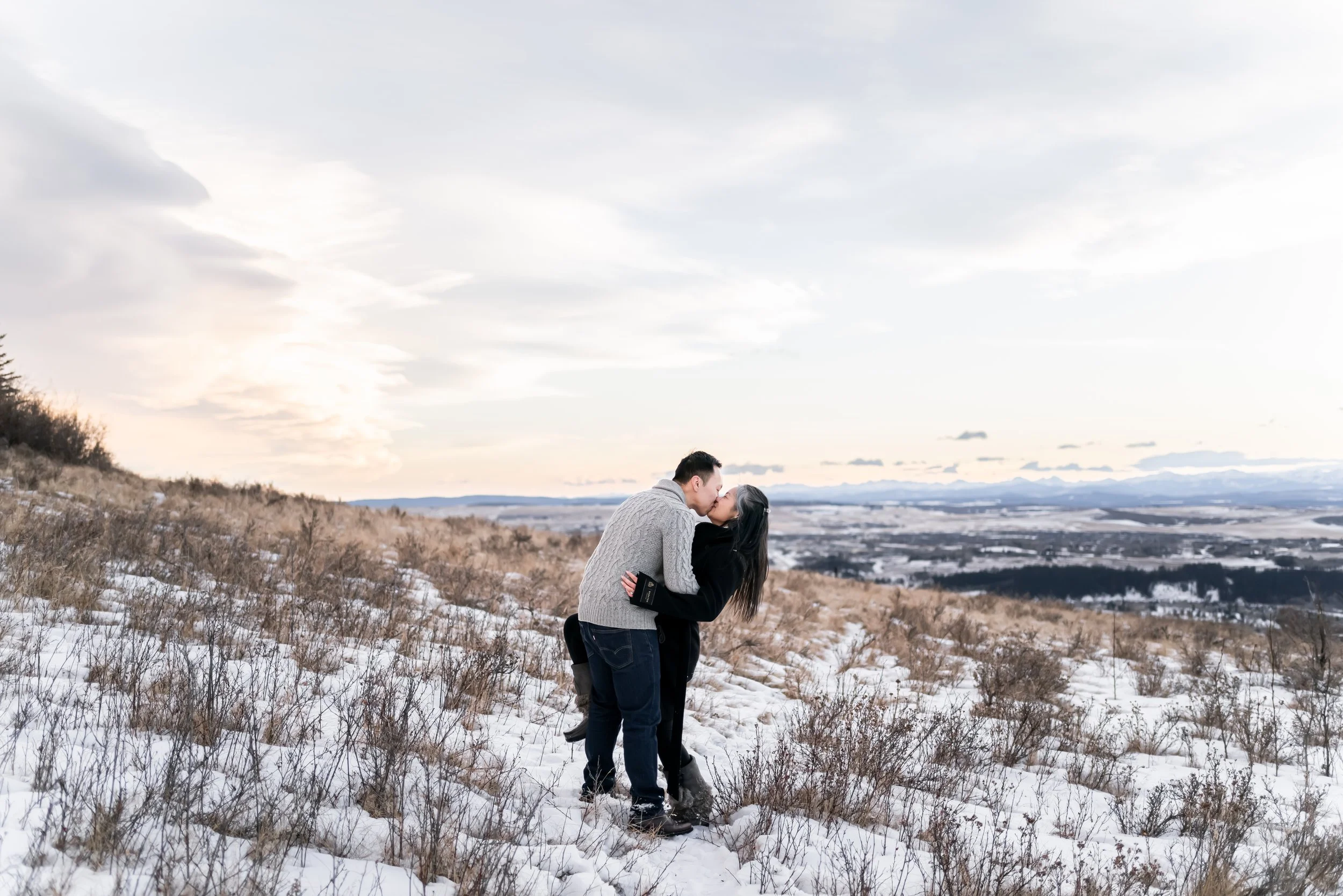 Celebrate your love story with timeless, natural engagement photography in Calgary. I’m Anastasia Kircheva, a professional photographer capturing authentic connection, emotion, and romance for couples across Calgary, Canmore, Banff, and beyond.

Whet