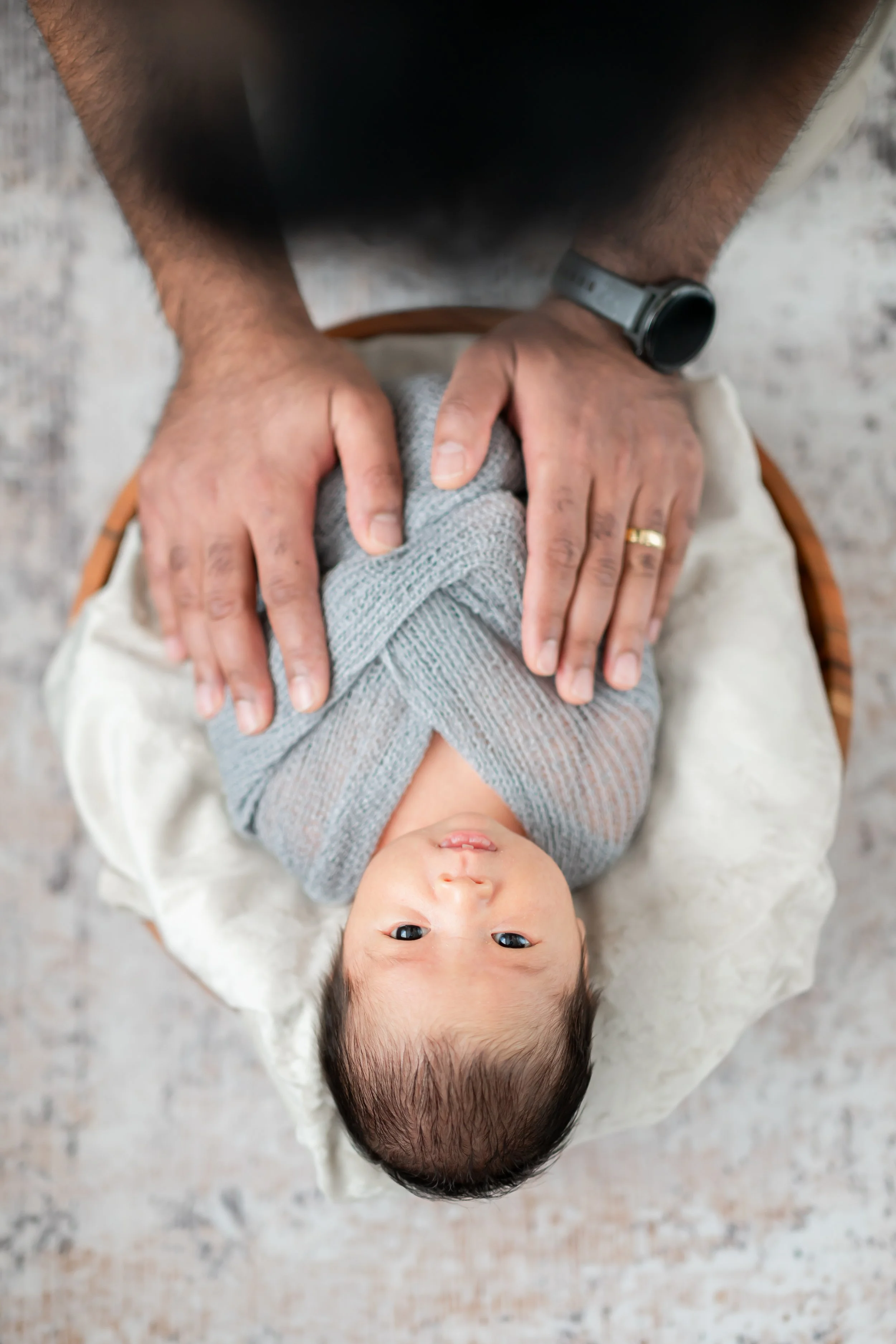 Welcome to the heartwarming world of Calgary newborn photography. Cherish the precious moments of your little one's arrival with our expert services. As a trusted newborn photographer in Calgary, we specialize in capturing the innocence and joy of th
