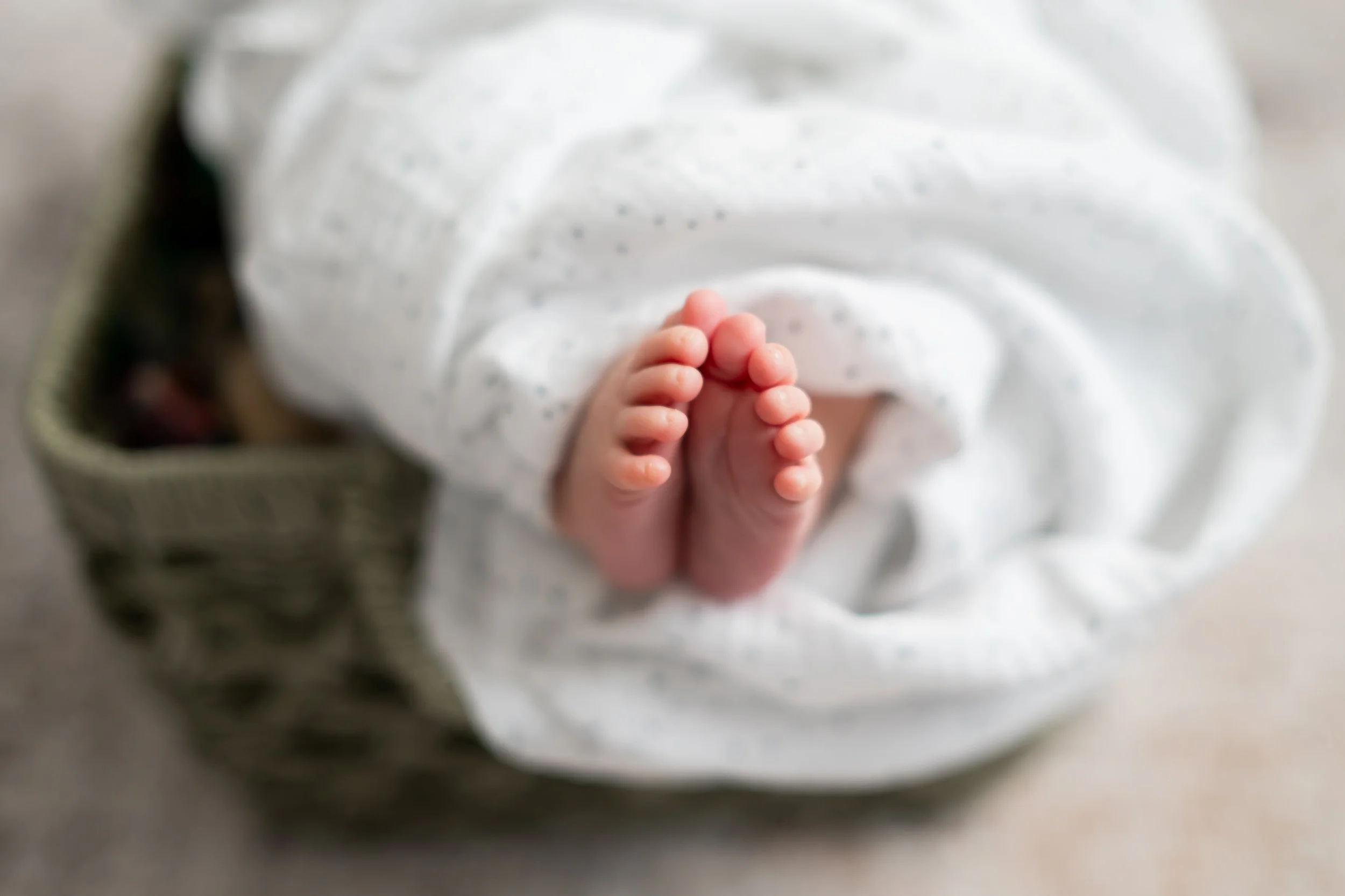 Welcome to the heartwarming world of Calgary newborn photography. Cherish the precious moments of your little one's arrival with our expert services. As a trusted newborn photographer in Calgary, we specialize in capturing the innocence and joy of th