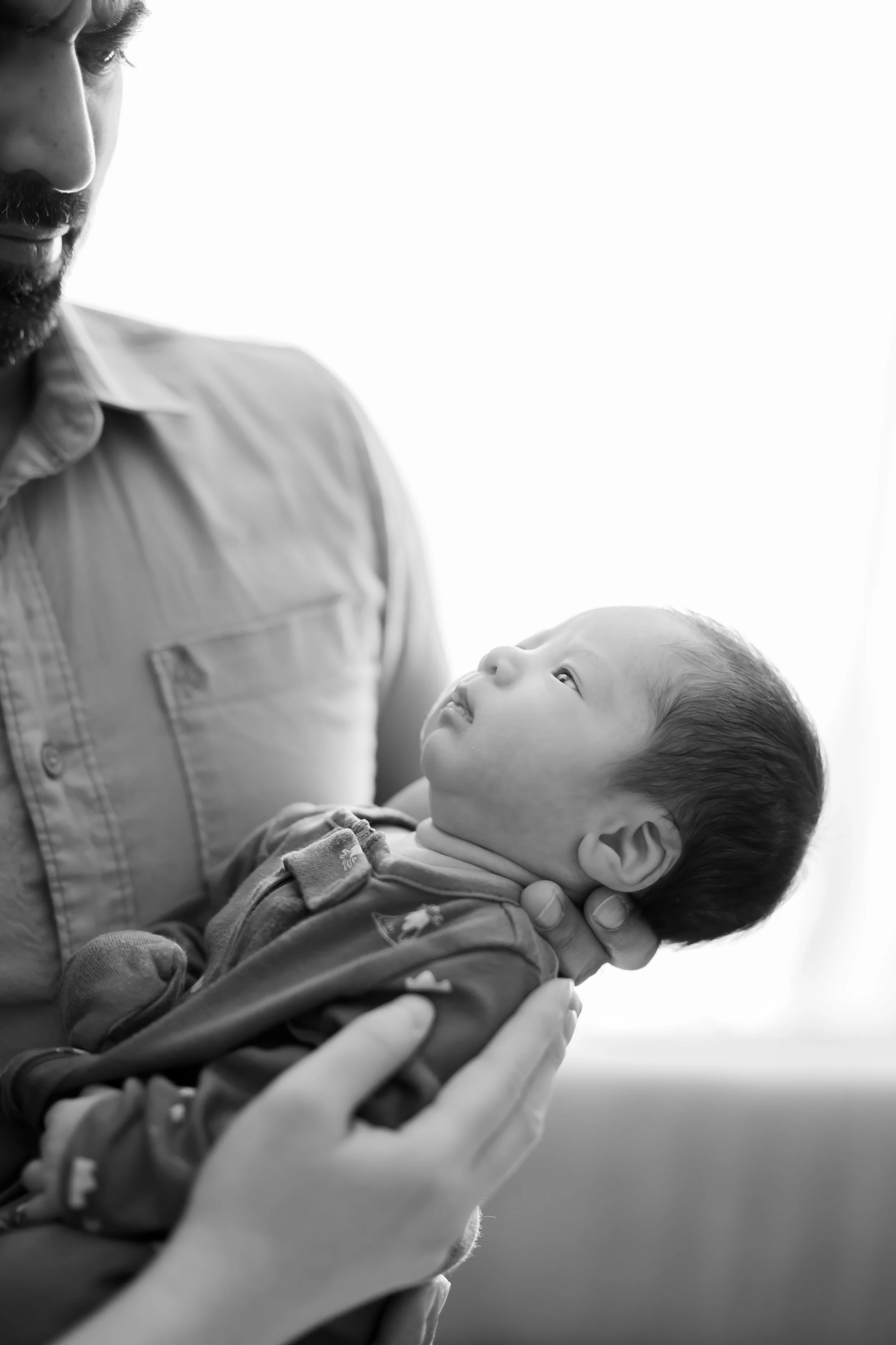 Welcome to the heartwarming world of Calgary newborn photography. Cherish the precious moments of your little one's arrival with our expert services. As a trusted newborn photographer in Calgary, we specialize in capturing the innocence and joy of th