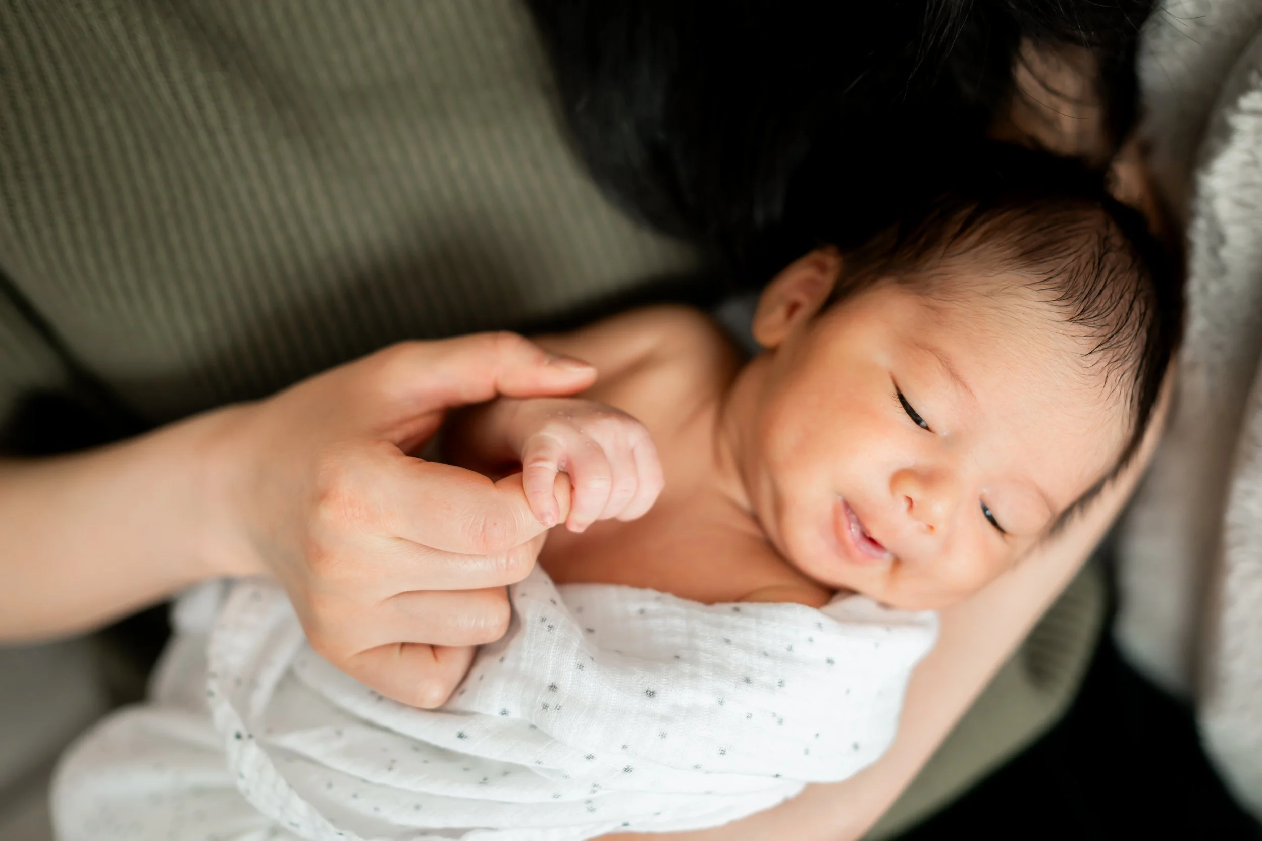Welcome to the heartwarming world of Calgary newborn photography. Cherish the precious moments of your little one's arrival with our expert services. As a trusted newborn photographer in Calgary, we specialize in capturing the innocence and joy of th