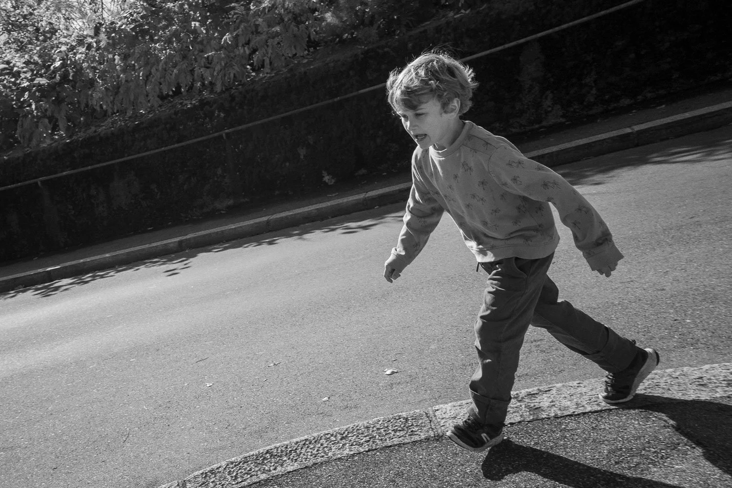 Boy running at Mon Repos, Lausanne, 2025