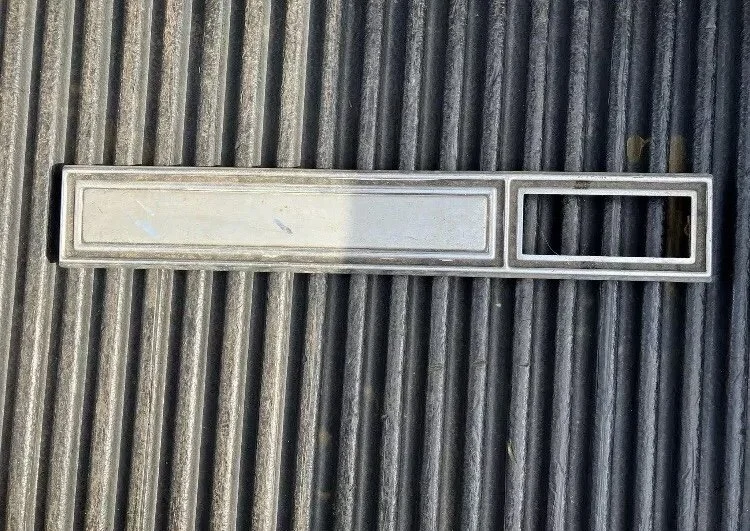 1970 Deville Calais rear bumper reverse light trim
