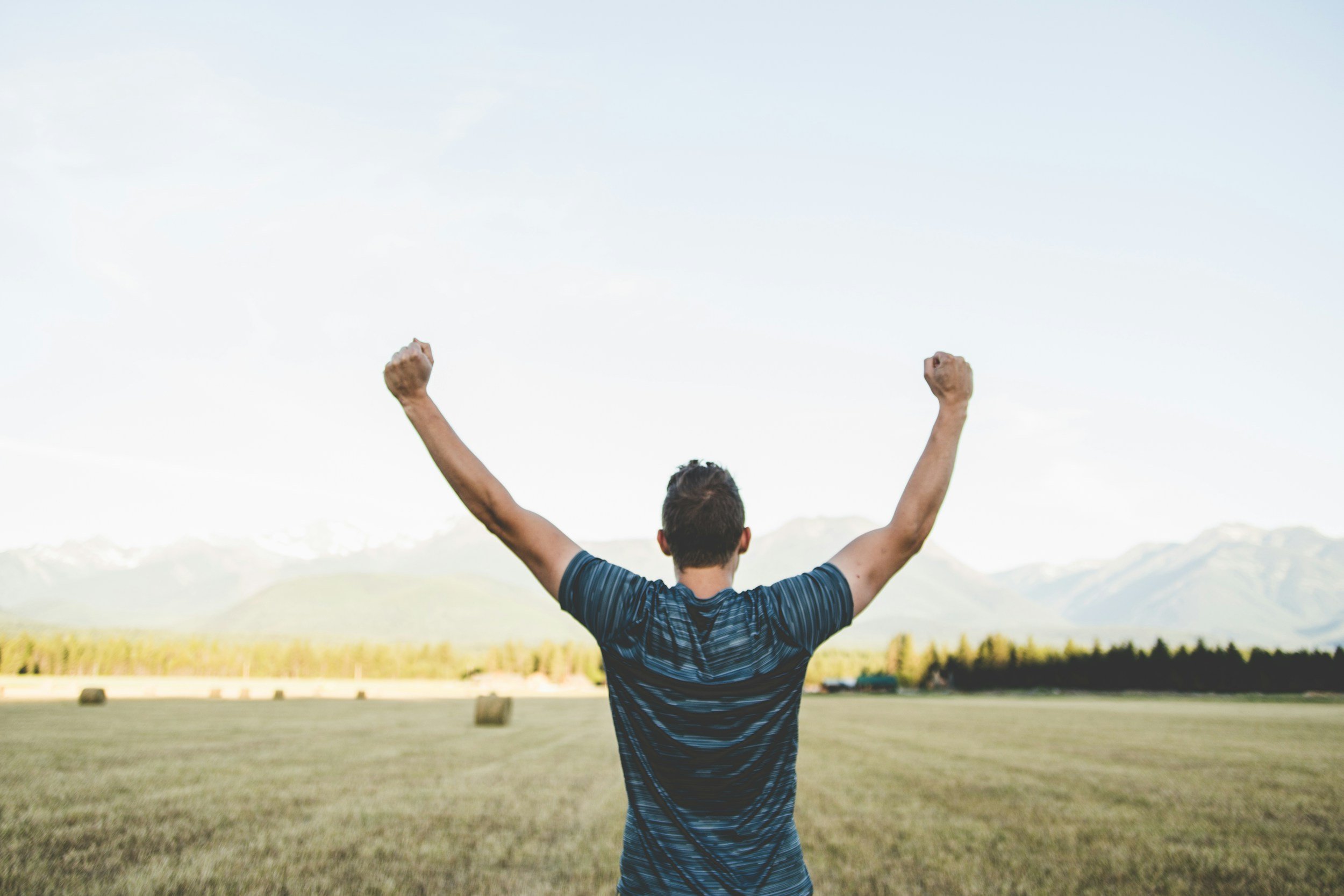 Man excited in field