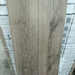 Bronze Oak - Waterproof laminate flooring - $1.50 per square ft. 15.9 square feet per box, $23.85 per box. Pad attached, 12 mil. wear layer & click lock install. Located in Boyd, can be shipped to our Menomonie store for pickup as well.