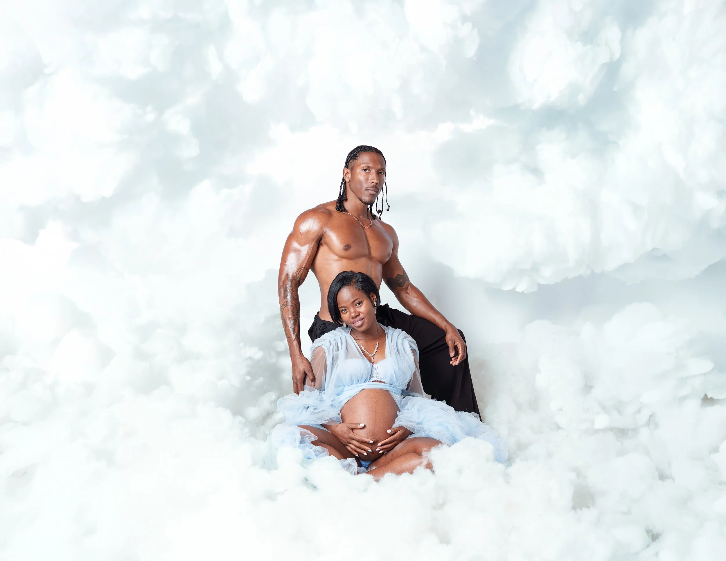 Atlanta maternity photography. Maternity cloud photoshoot. Plus fitness male model.