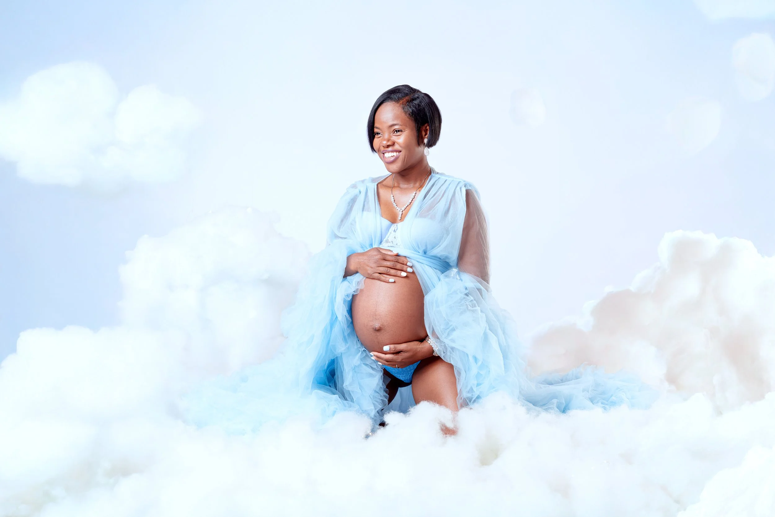 Atlanta maternity photography. Maternity cloud photoshoot. 
