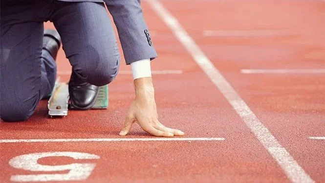 Businessman starting a race