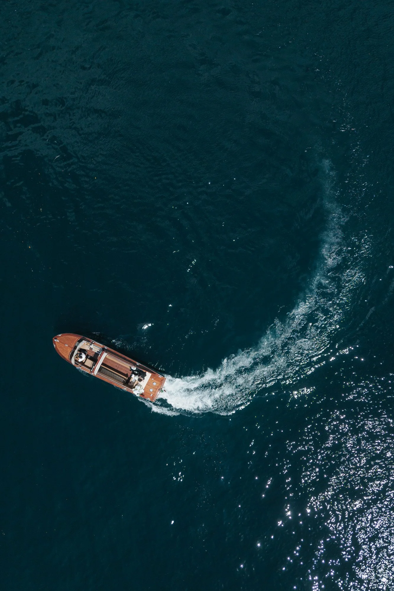 couple on boat lake como