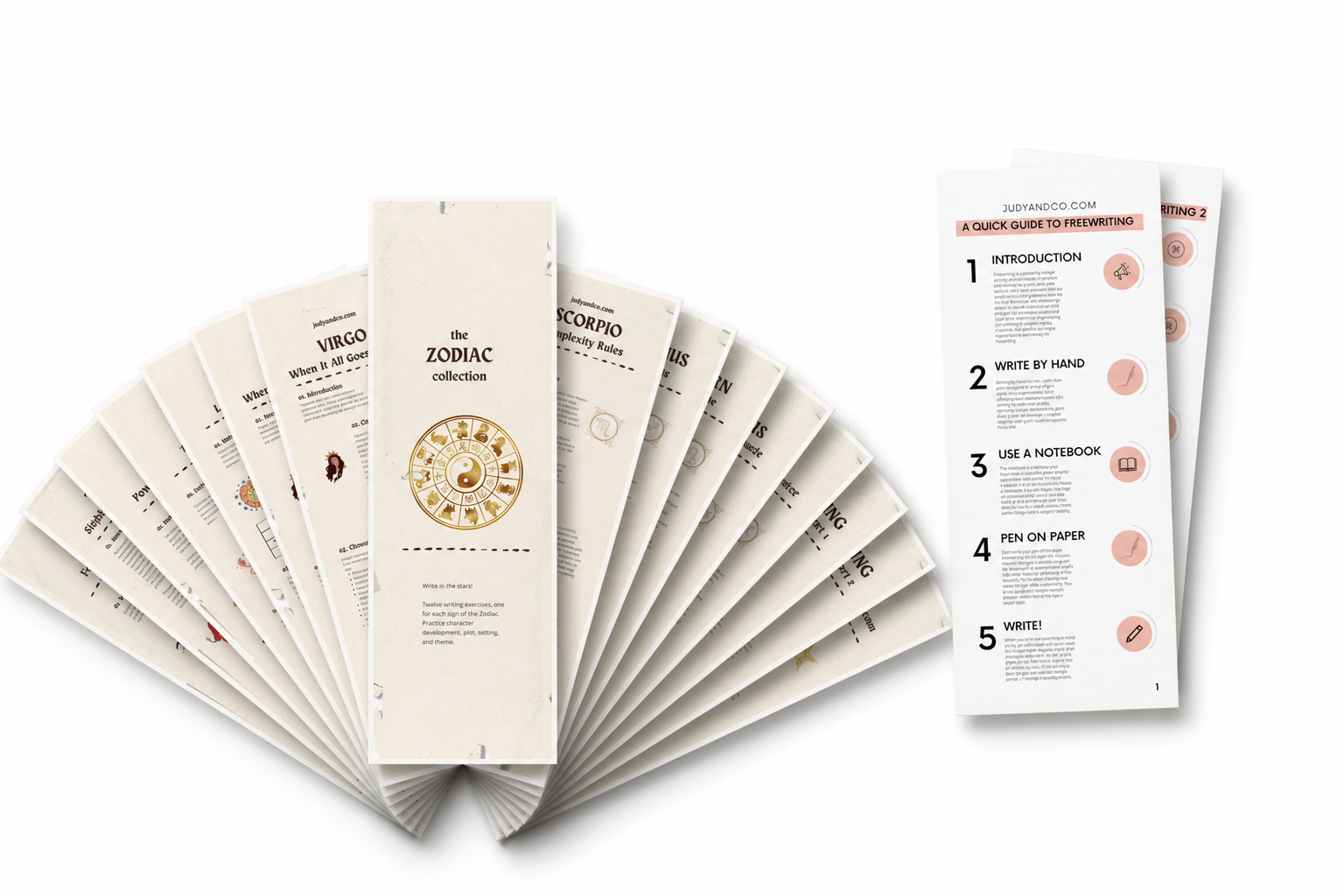 Collection of printed zodiac-themed writing exercises, with step by step instructions for practicing writing skills, fanned out on a white surface, with a two-page guide to free-writing visible on the right.