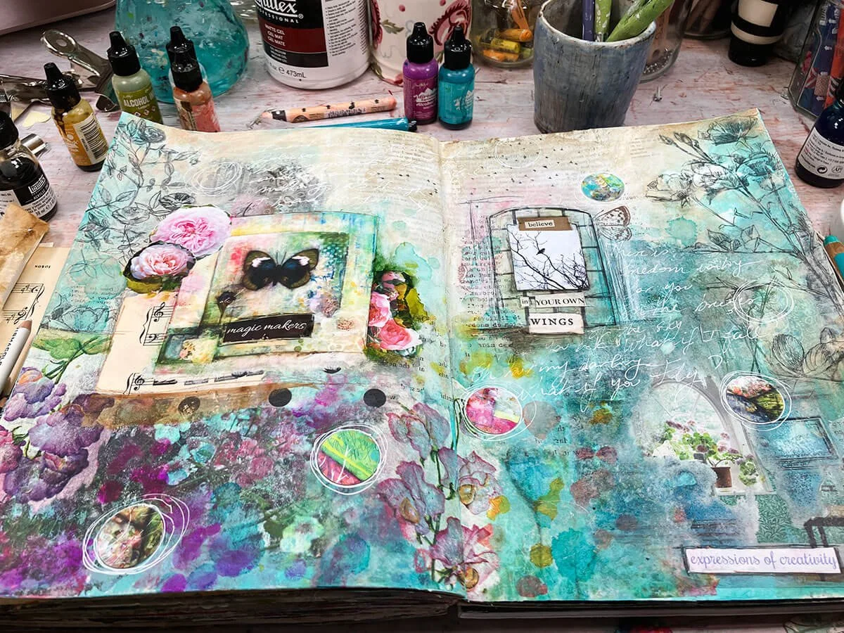 Mixed media collage created with magazine images, paint layers and hand-drawn marks.