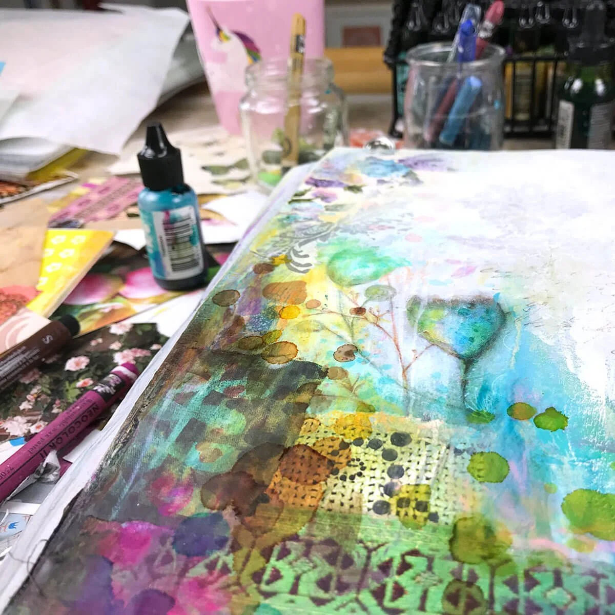 Layered mixed media artwork showing paint, collage and drawing textures.