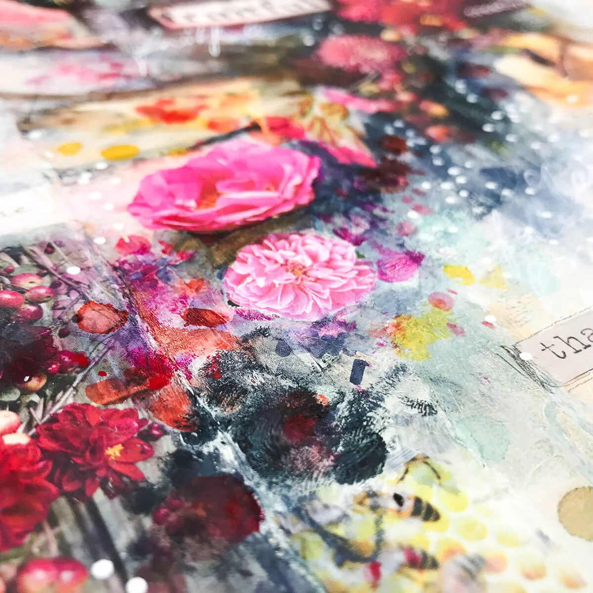 Mixed media collage created with magazine images, layered papers and paint.