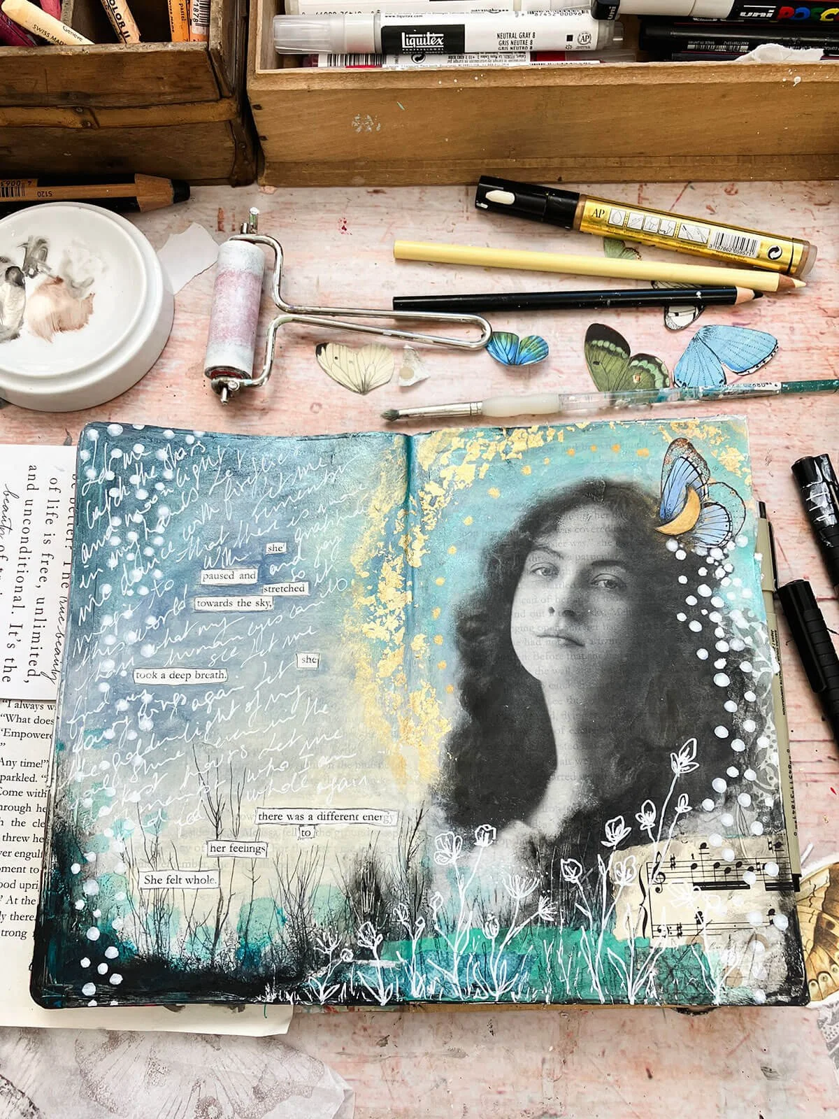 Art journal spread with a vintage black and white photo of a lady.