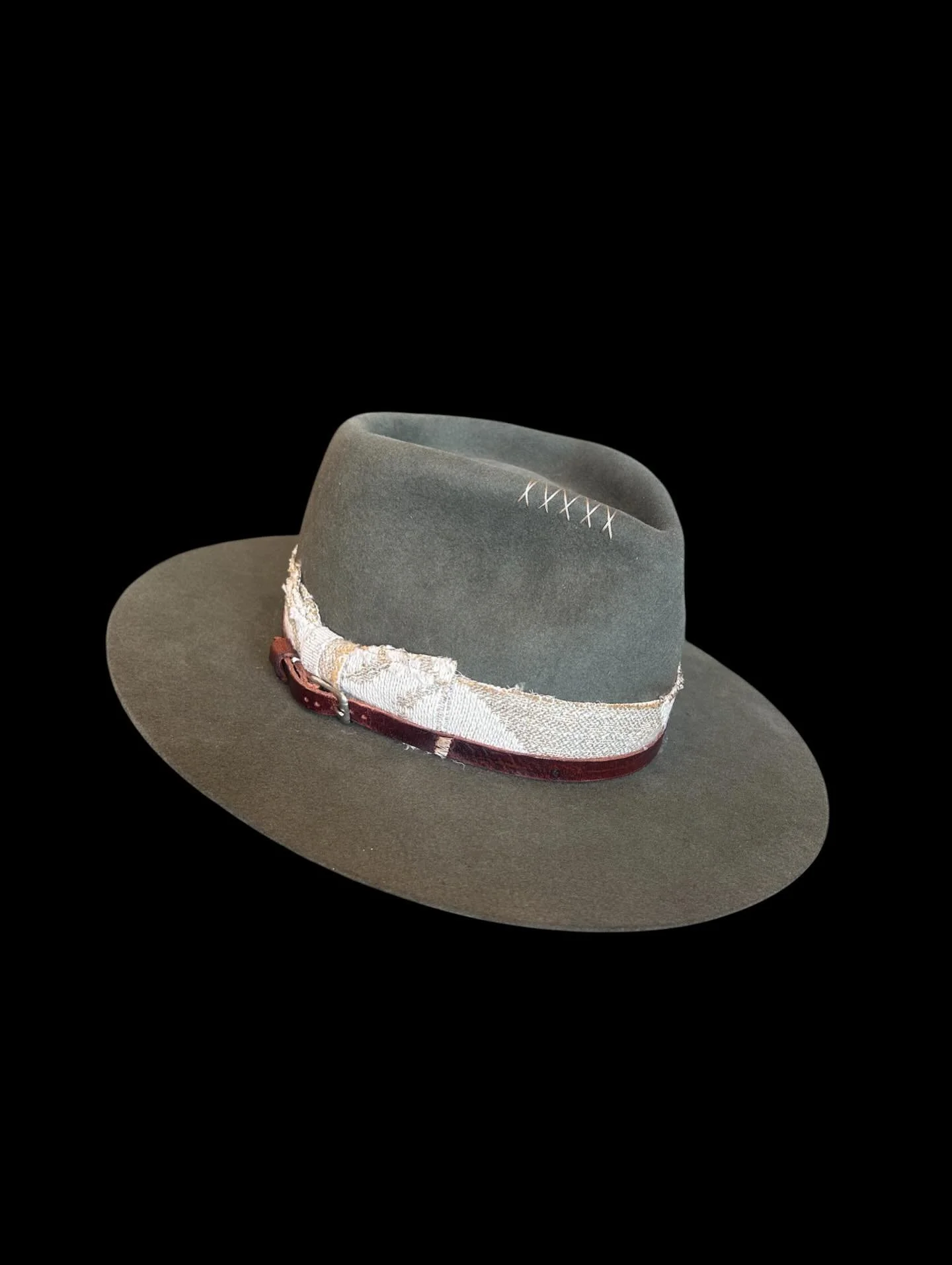 (handmade leather buckle band with vintage buckle, btw)