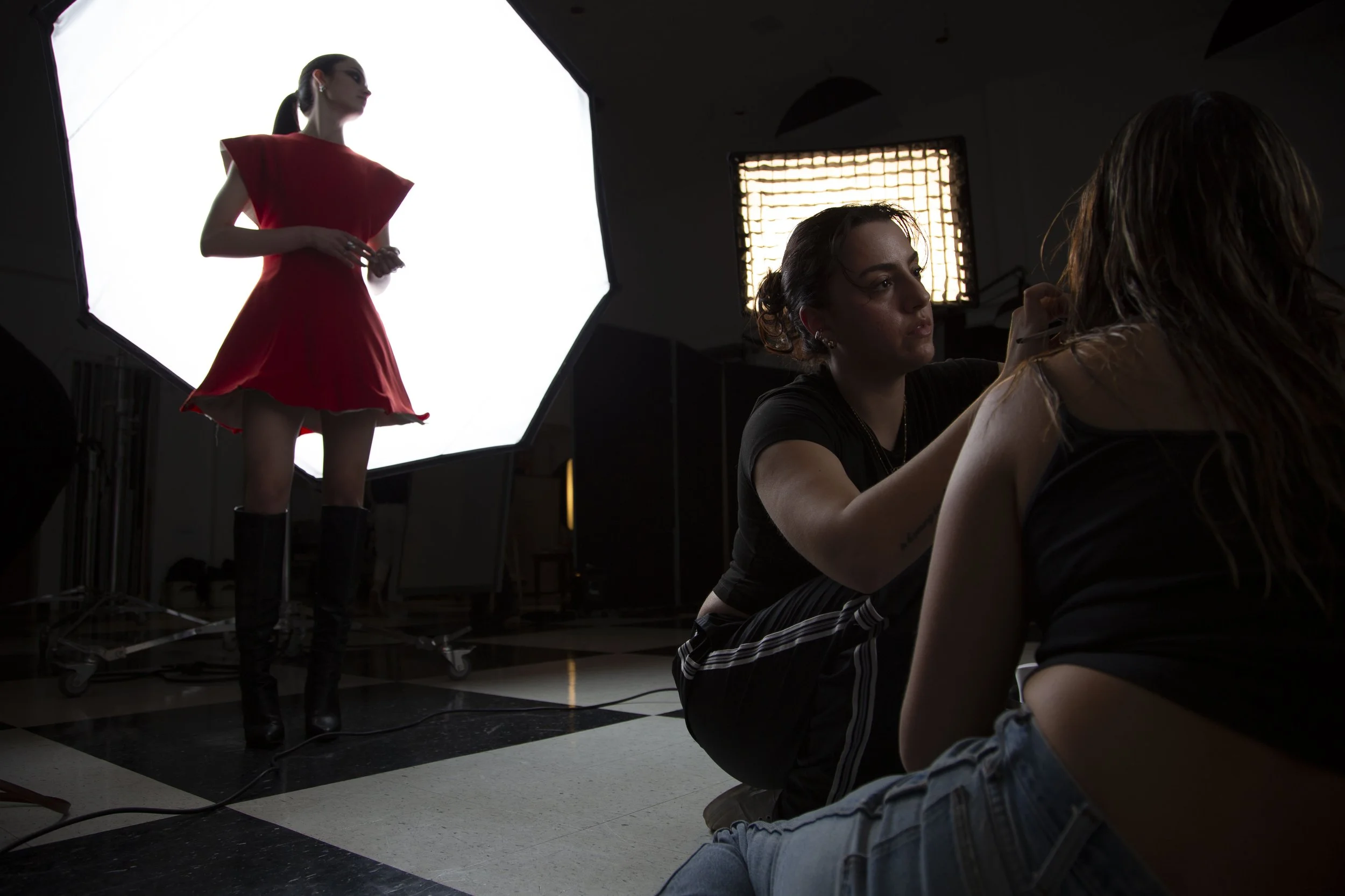 9.	Final touches are put on the makeup before Layla’s senior collection photoshoot.