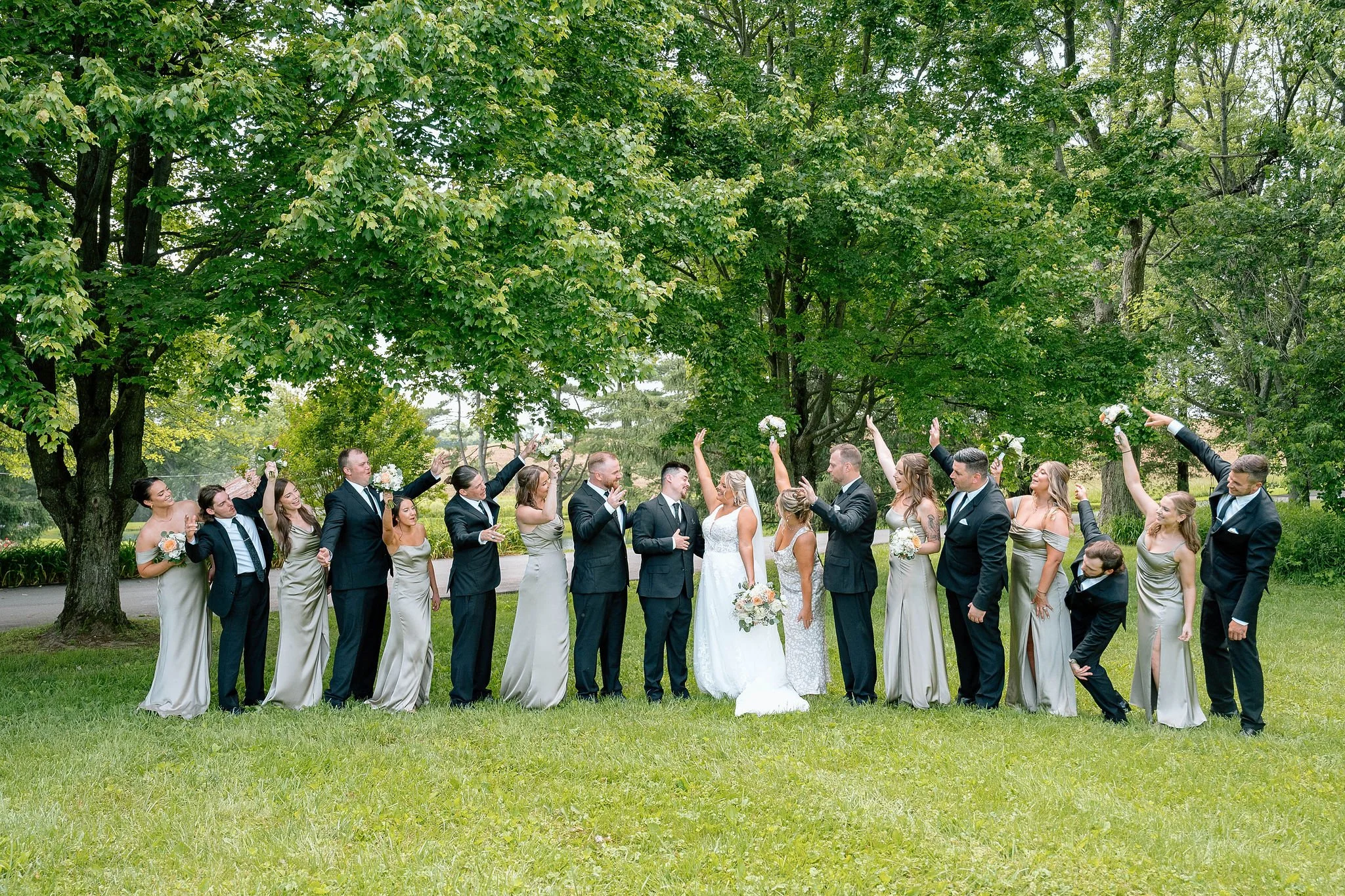 Wedding party celebrates at outdoor wedding venue in Maryland