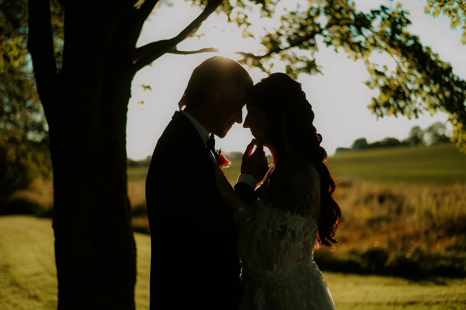 bride and groom during golden hour at outdoor venue