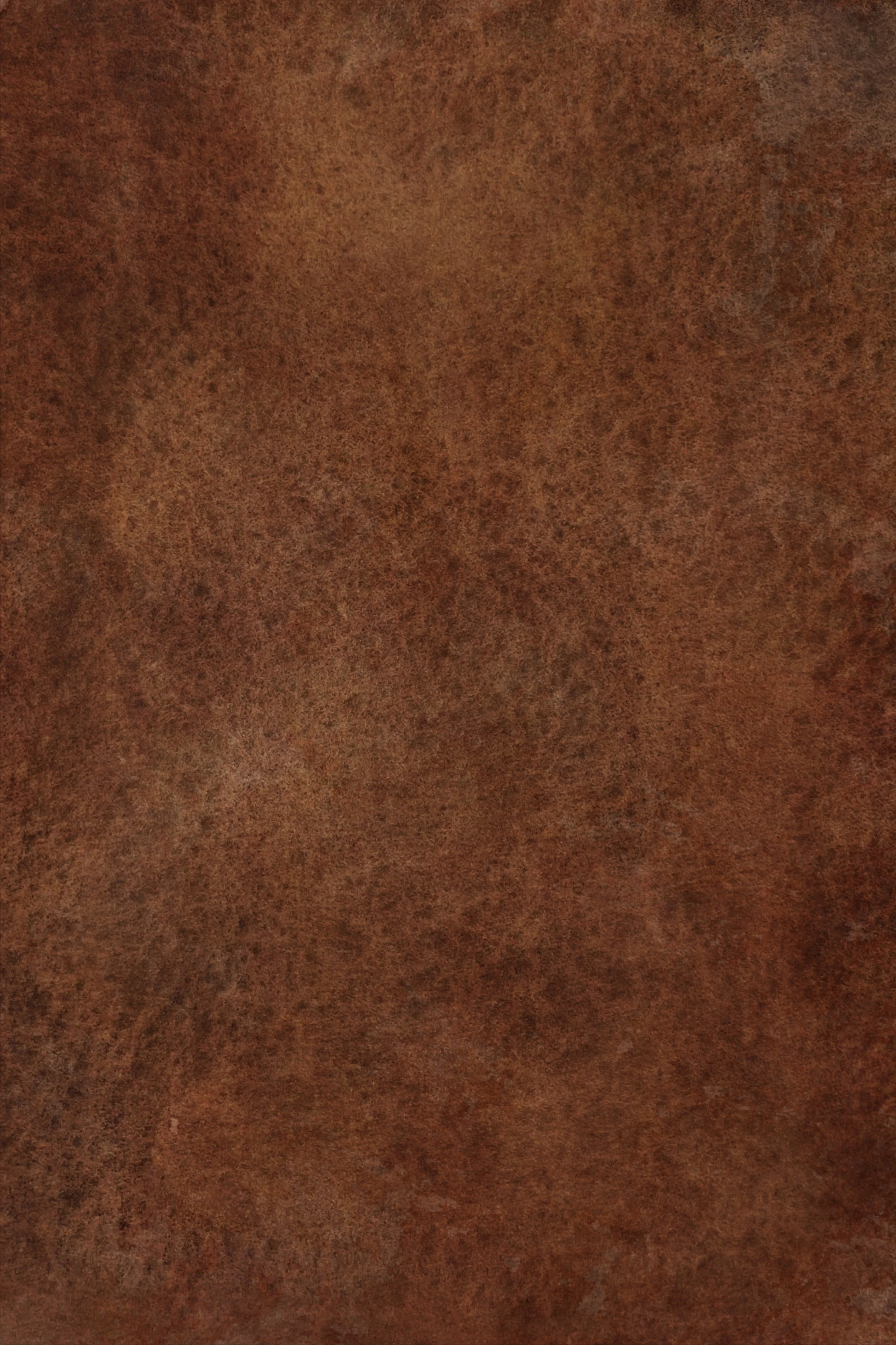 Close-up of a brown, textured, worn leather surface.