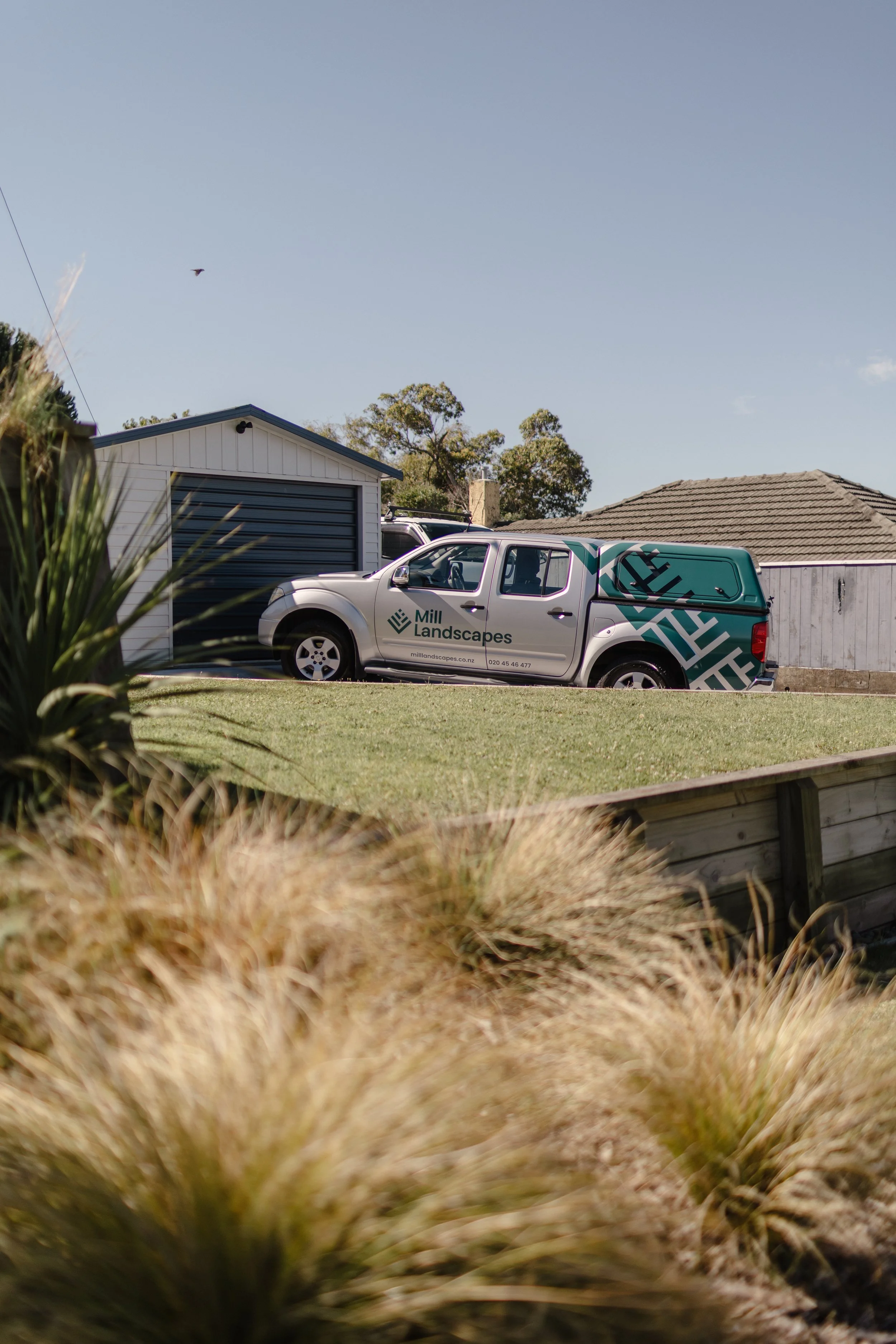 Mill Landscapes visual identity and vehicle graphics designed by Holiday Studio