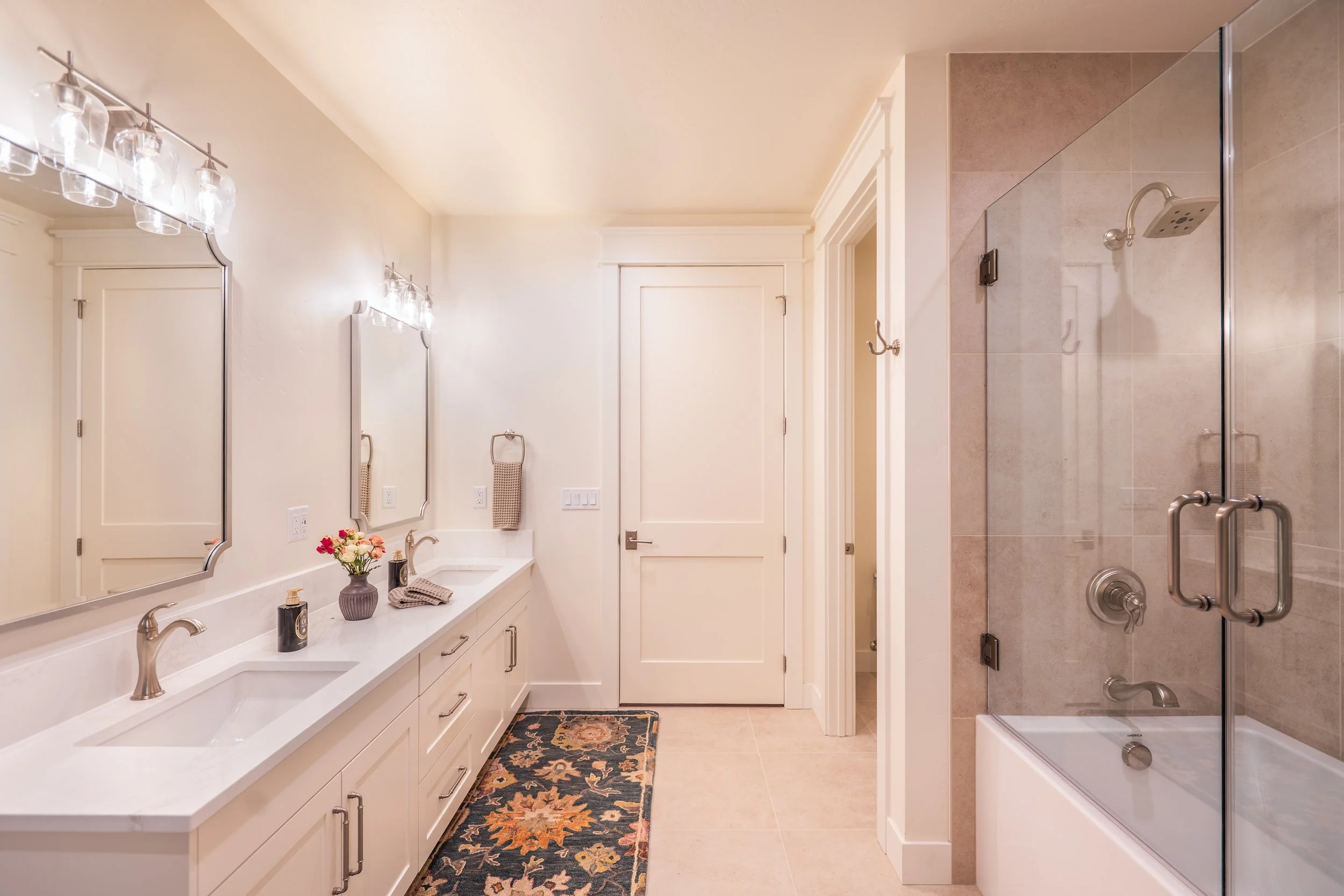 guest-bath-tile-custom-home-montana-missoula-basement-tub-shower-sink-quartz-countertop-brushed nickel.jpg