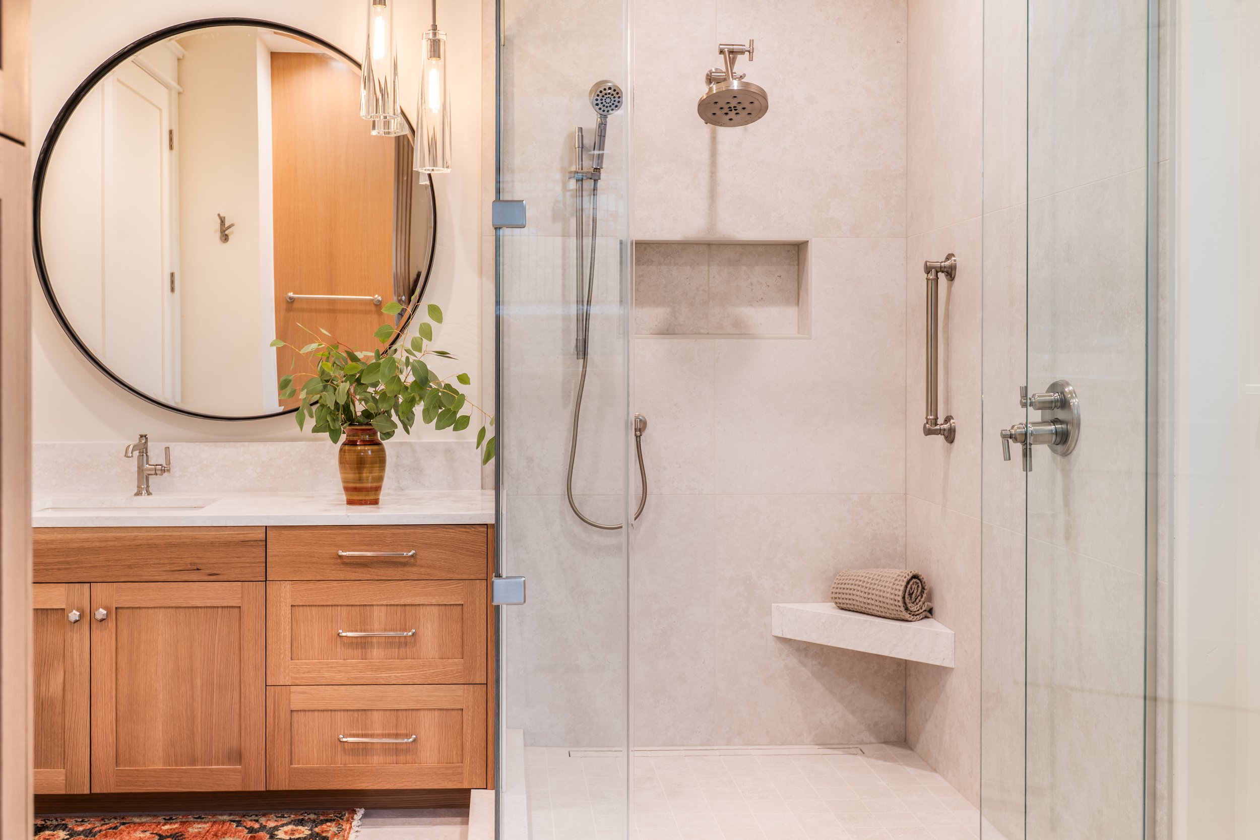 guest-bath-tile-custom-home-montana-missoula-shower-sink-quartz-countertop-brushed nickel-mirror-glass-bench.jpg