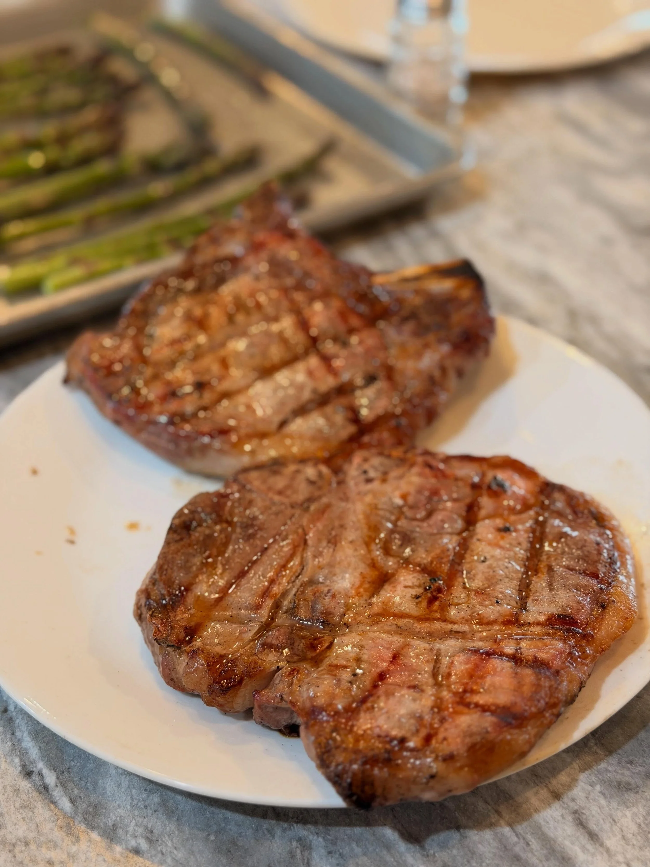 We brought home the latest pork harvest and these bone-in pork chops and ham steaks are absolutely divine.  We are big fans of slow food around here&hellip;meaning the slower they grow the more flavorful they become.

So we tried an experiment with o