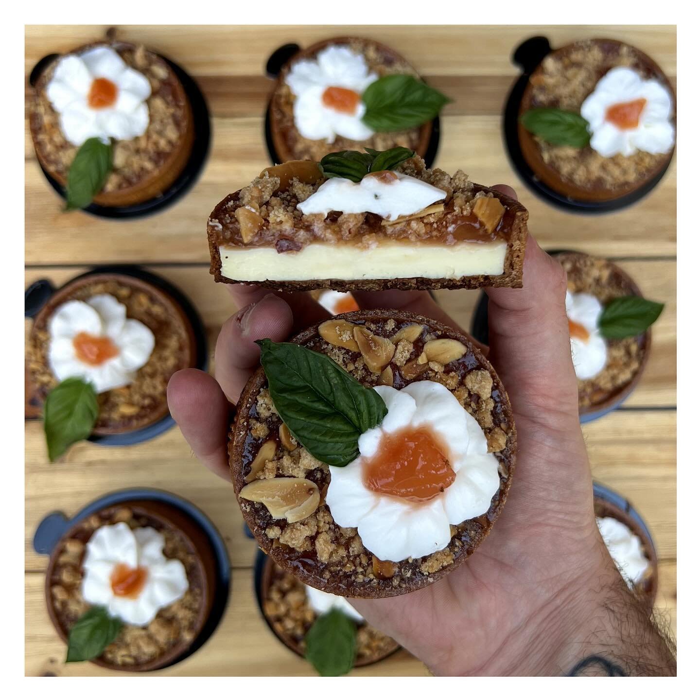 Peaches and cream 🍑 دراق ! The nice labneh cremeux you guys love, topped with a sweet chunky peach preserves and an almond streusel. It will be available at all the popups going forward until we get tired of peaches. 
.
.
.
.
.
.
#peaches #tart #pas