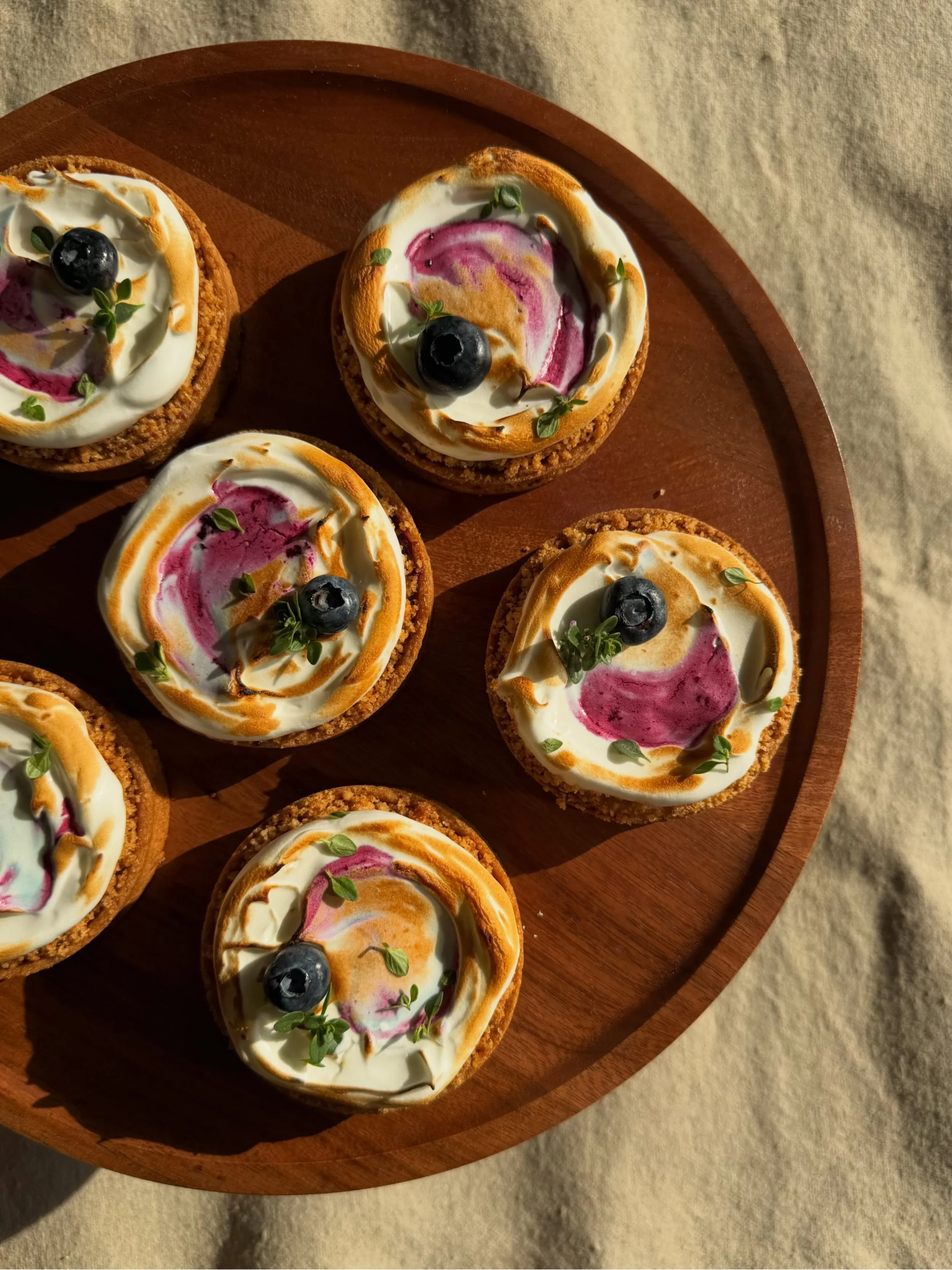 Preserved Lemon &amp; Blueberry Tart 🍋🫐

Nice and tart preserved lemon curd, topped with a sweet calming blueberry compote and the obligatory toasted meringue, of course with an artistic swirl of blueberry juice. 

This tart is perfect for a hot su