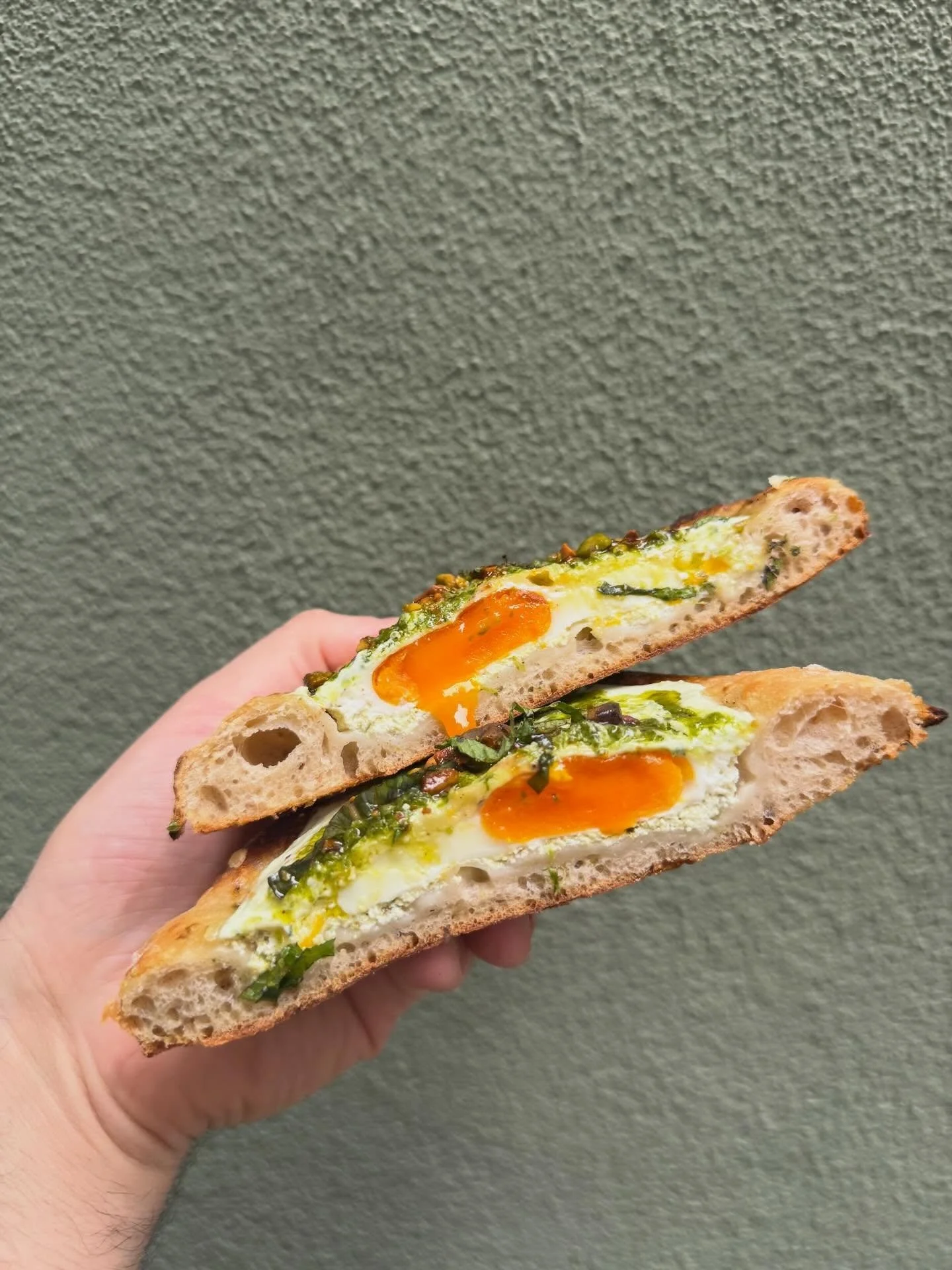 Ramps Turkish Eggs is BACK !! 
She is screaming SPRING. 
Herby ramp labneh sauce, topped with egg, Kashkawan cheese, more ramp labneh, ramps green shatta, and 
pistachios 💚 
.
.
.
.
.
.
#rampsseason #spring #majdalbakery