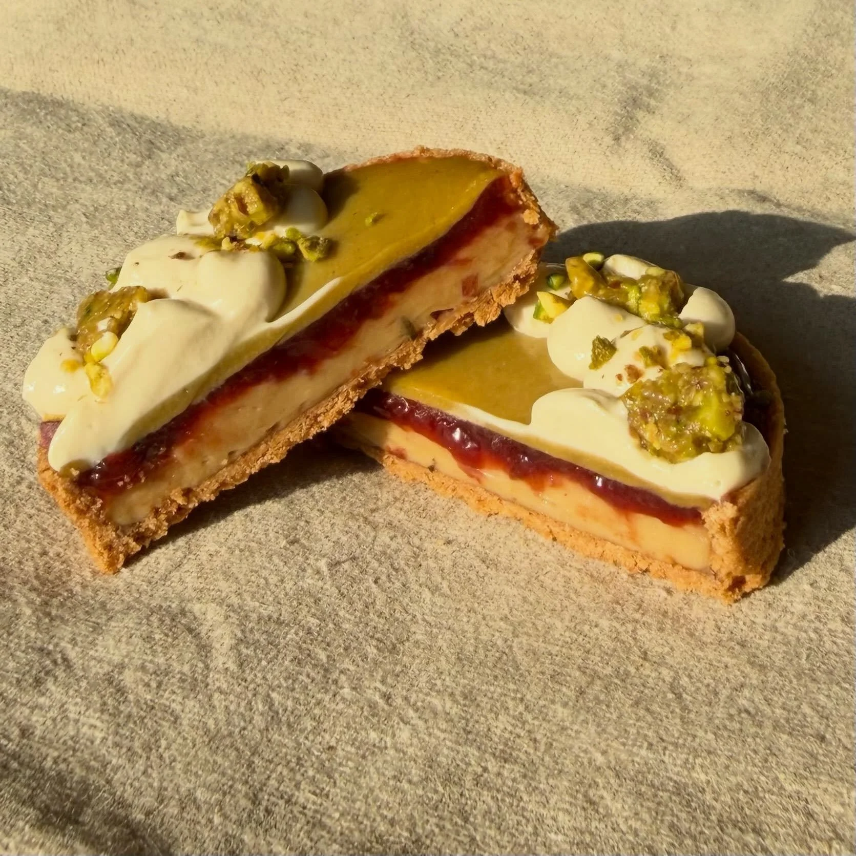 Stone fruit, pistachio, and pomegranate molasses tart!! 

Two years ago, I made this tart with the same components and flavors, but the construction was different, which resulted in a very delicious tart but it wasn&rsquo;t easy to handle or sell at 